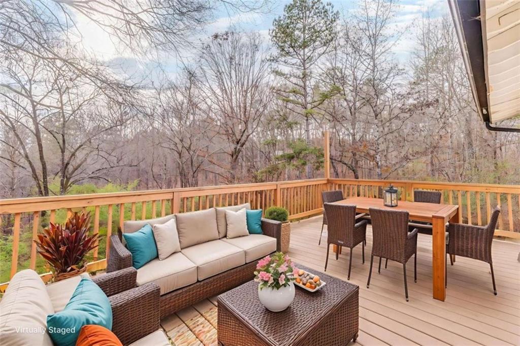 197 Colquitt Road Cedartown, GA 30125 - Photo 46 of 62 a balcony with furniture and wooden floor