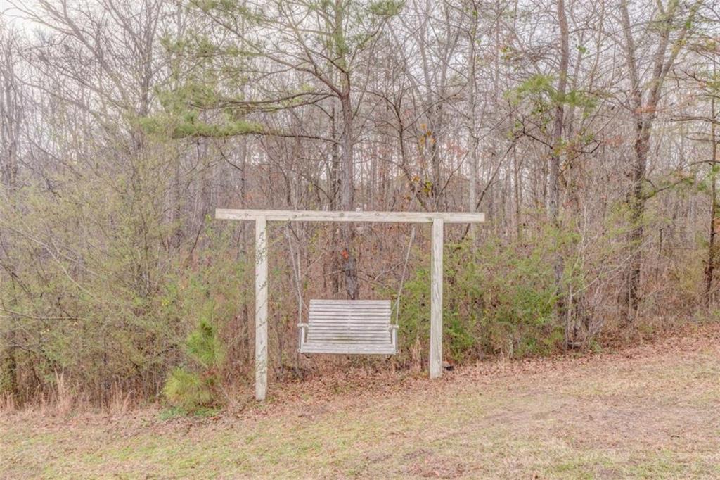 197 Colquitt Road Cedartown, GA 30125 - Photo 53 of 62 a backyard of a house with lots of green space