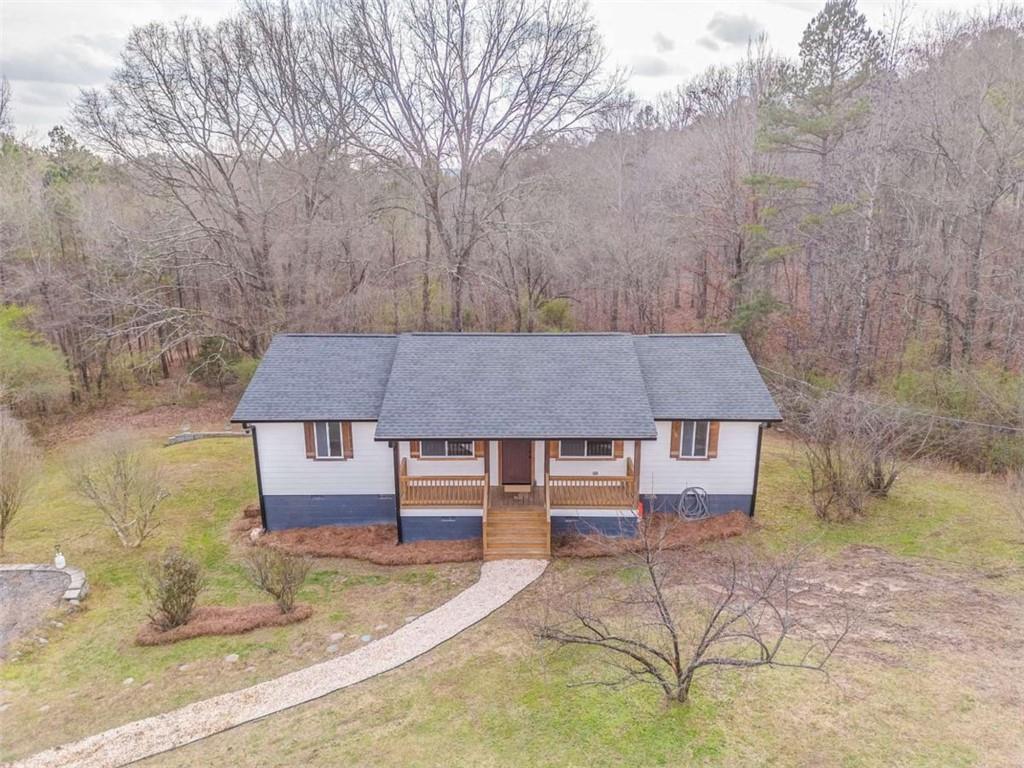 197 Colquitt Road Cedartown, GA 30125 - Photo 55 of 62 a house that has a tree in front of it