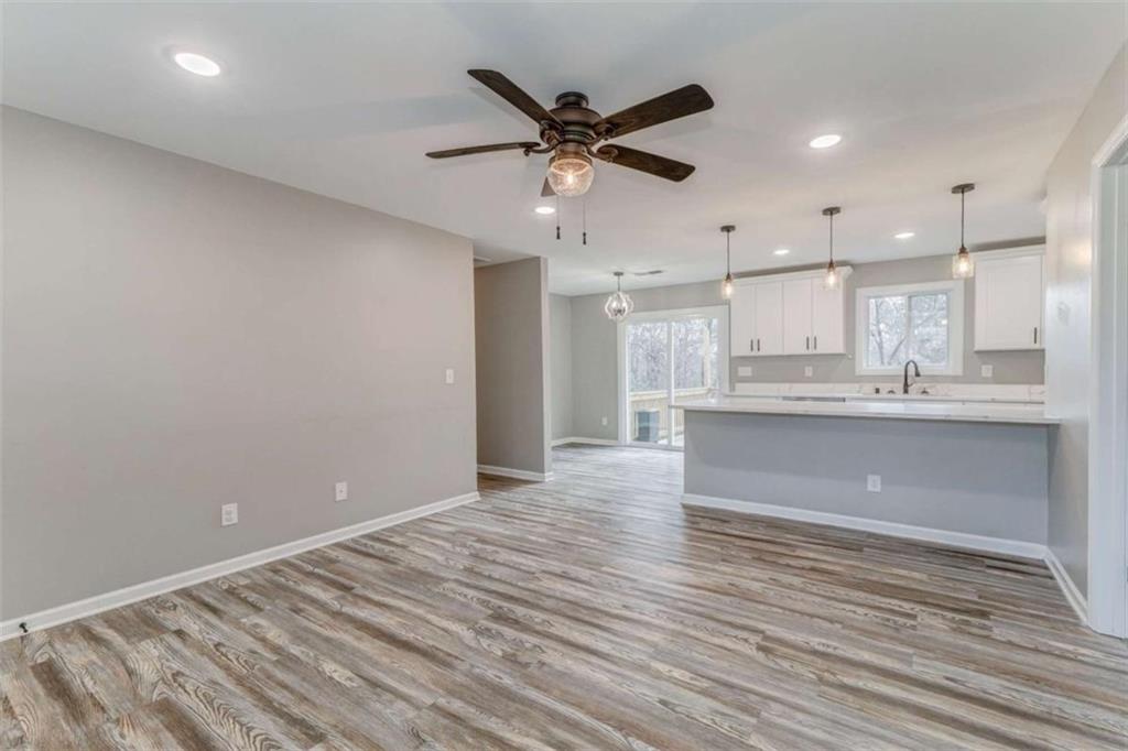 197 Colquitt Road Cedartown, GA 30125 - Photo 7 of 62 a view of kitchen with kitchen island wooden floor and ceiling fan