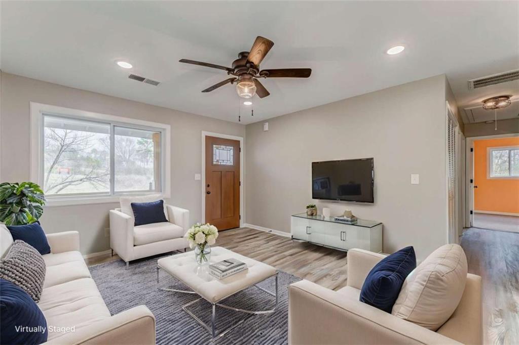 197 Colquitt Road Cedartown, GA 30125 - Photo 8 of 62 a living room with furniture and a flat screen tv