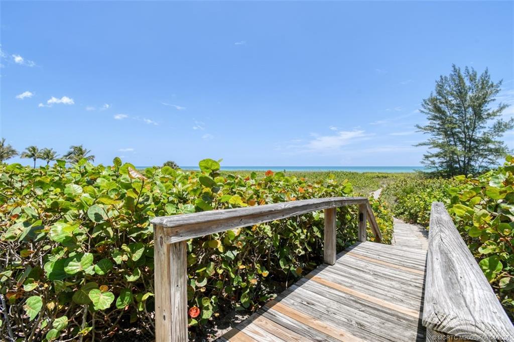 485 South Beach Road Hobe Sound, FL 33455 - Photo 6 of 12 a view of a balcony with wooden floor
