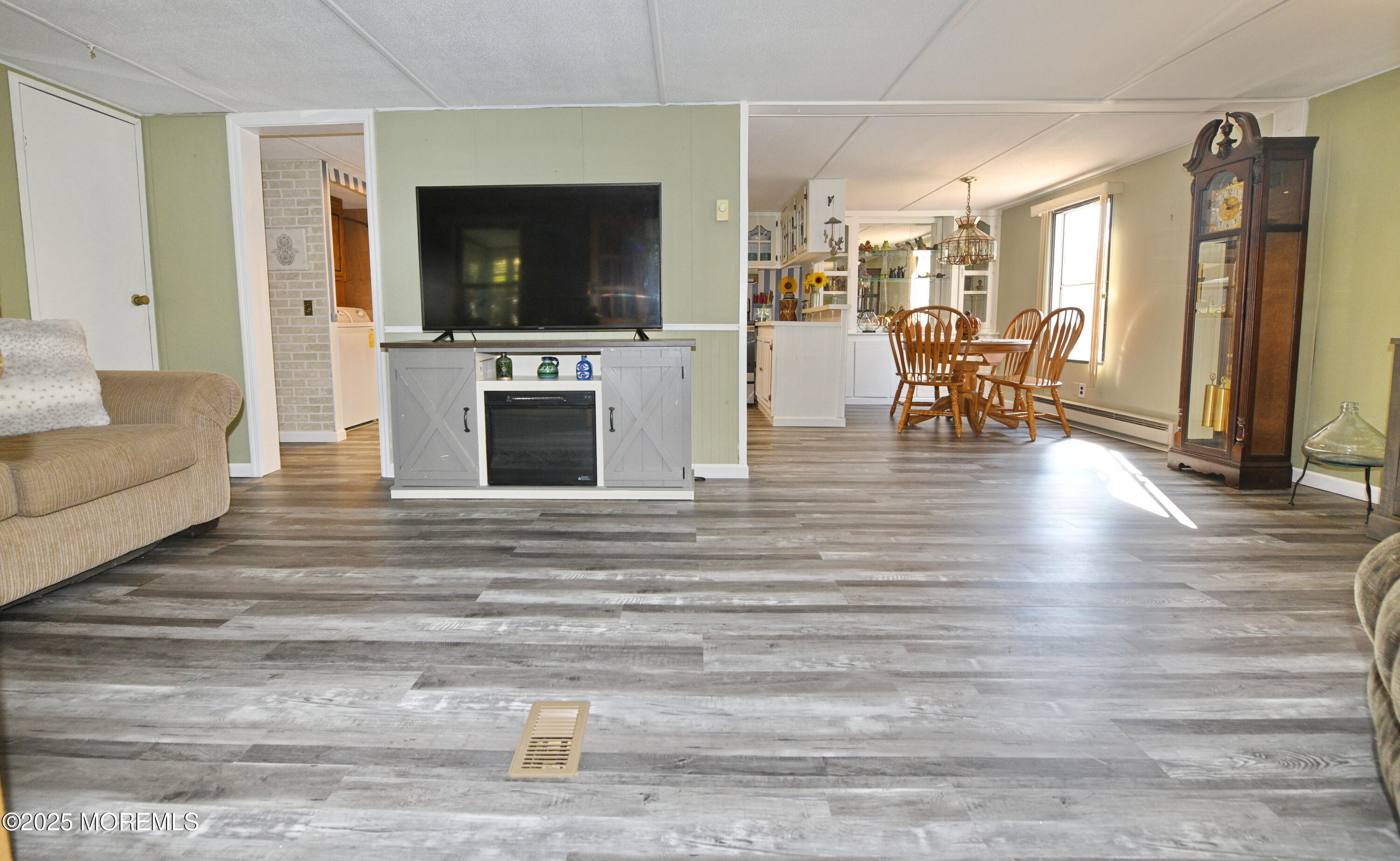 35 Judith Way Jackson, NJ 08527 - Photo 11 of 20 a living room with furniture and a flat screen tv