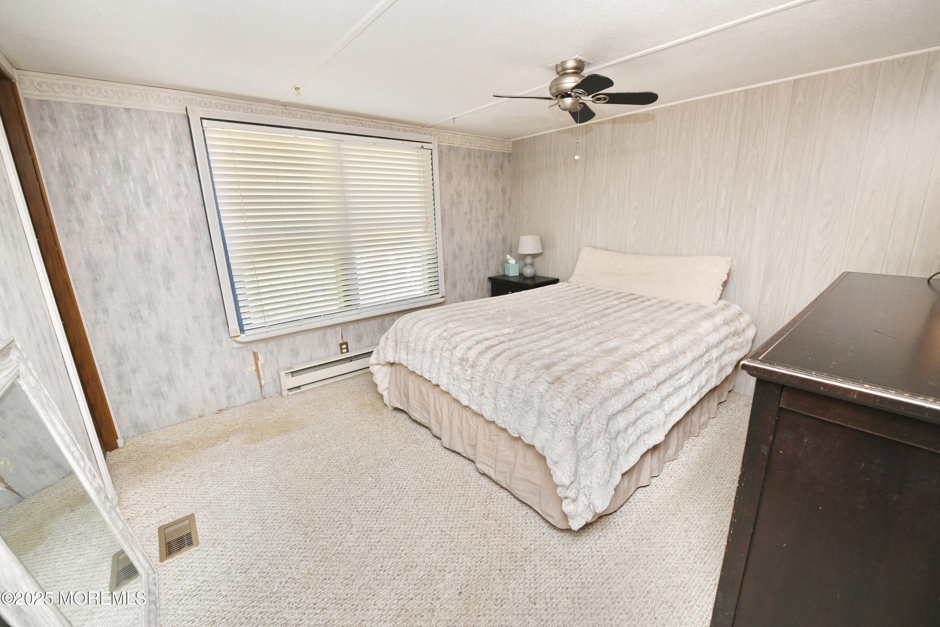 35 Judith Way Jackson, NJ 08527 - Photo 15 of 20 a bedroom with a bed dresser and a window