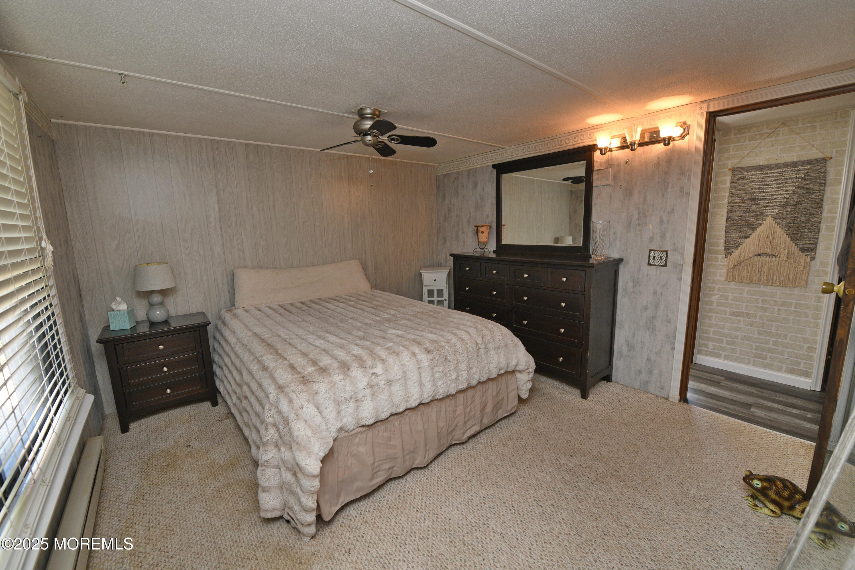 35 Judith Way Jackson, NJ 08527 - Photo 16 of 20 a bedroom with a bed and a dresser