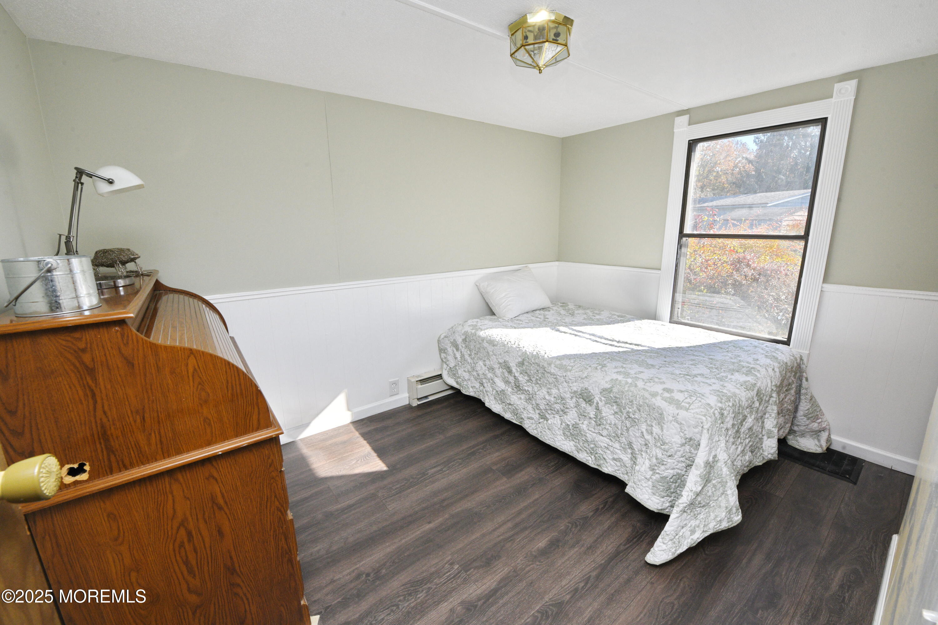 35 Judith Way Jackson, NJ 08527 - Photo 19 of 20 a bedroom with a bed and wooden floor