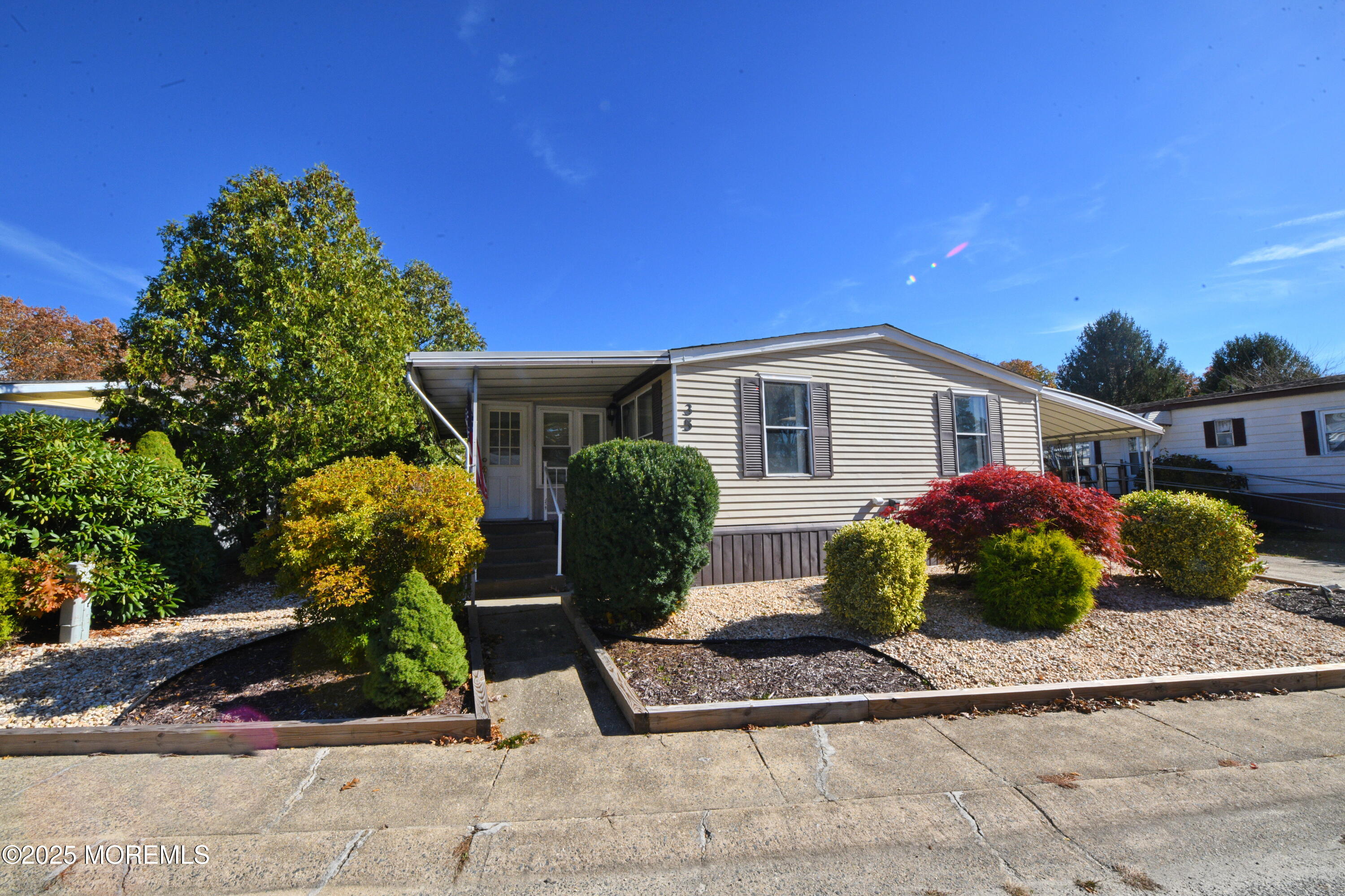 35 Judith Way Jackson, NJ 08527 - Photo 3 of 20 a view of a house with backyard and garden