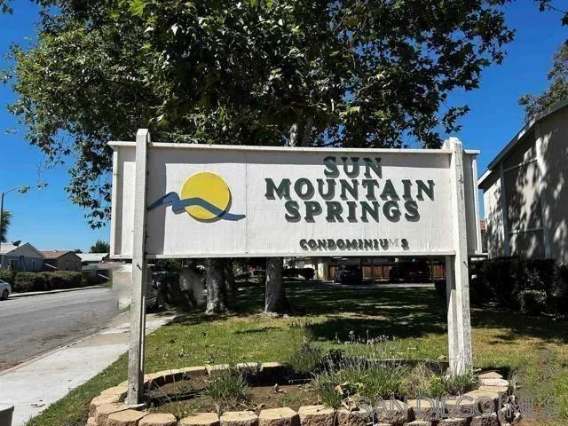 a sign on the side of a road