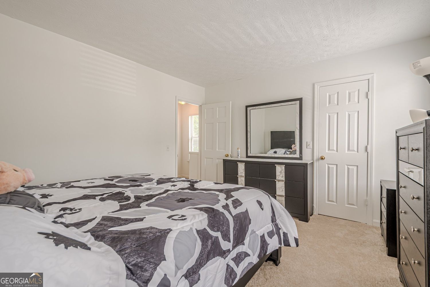 3403 Spring Harbor Lane Doraville, GA 30340 - Photo 14 of 27 a bedroom with a bed and a television
