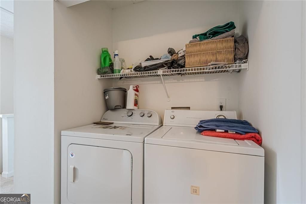 3403 Spring Harbor Lane Doraville, GA 30340 - Photo 19 of 27 a utility room with dryer and washer