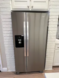 a living room with a fireplace