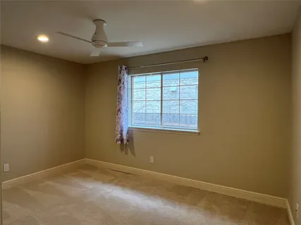 a view of a storage & utility room with racks on the wall