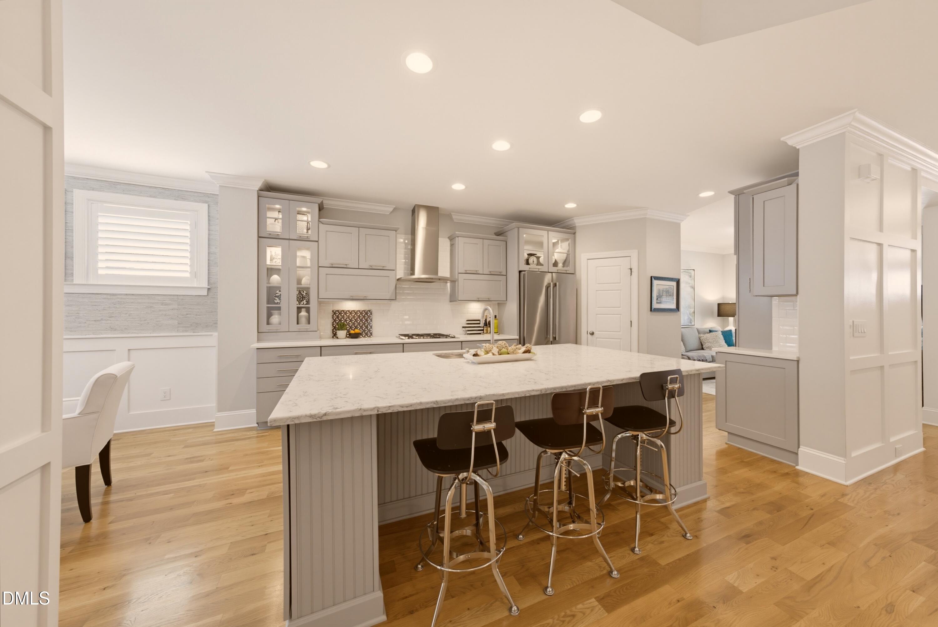 11821 Friendship Oak Trail Raleigh, NC 27613 - Photo 13 of 49 Large island with sitting area