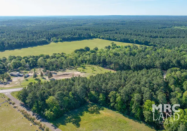 a view of a lake with a yard