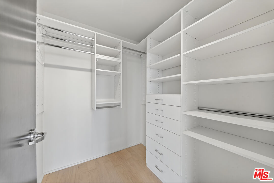 1100 South Hope Street, Unit 1501 Los Angeles, CA 90015 - Photo 31 of 63 a view of an empty walk in closet