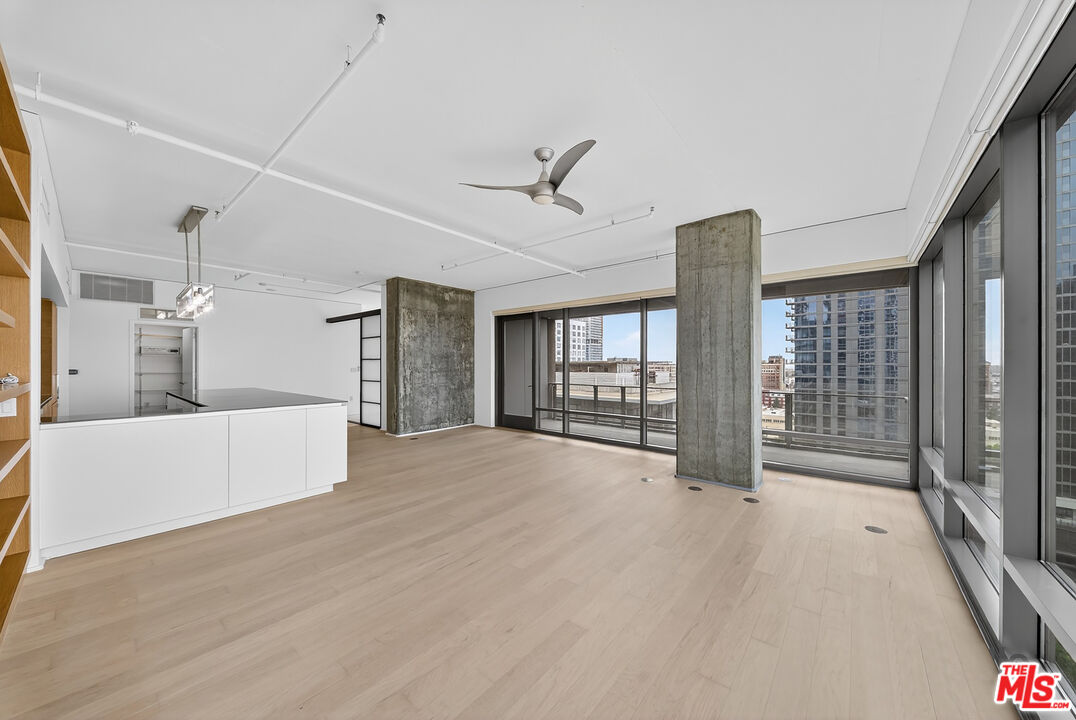1100 South Hope Street, Unit 1501 Los Angeles, CA 90015 - Photo 36 of 63 a view of an empty room with a window