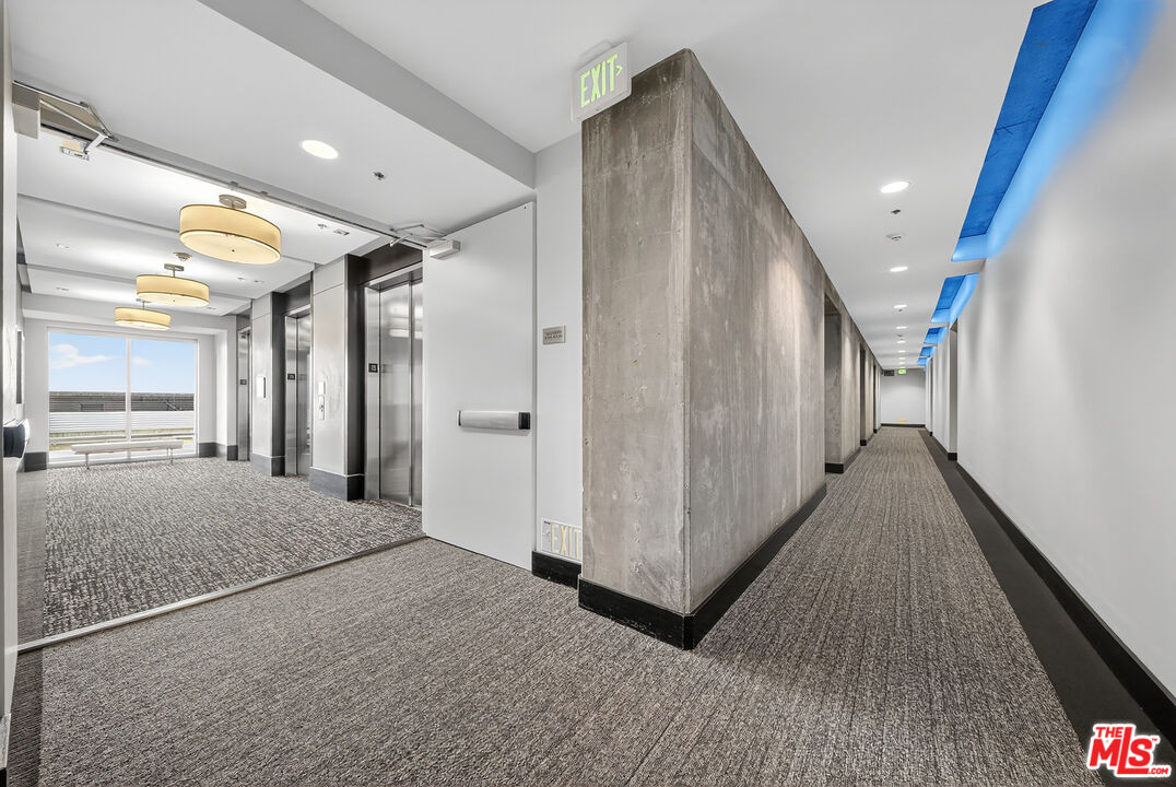 1100 South Hope Street, Unit 1501 Los Angeles, CA 90015 - Photo 44 of 63 a view of hallway with stairs