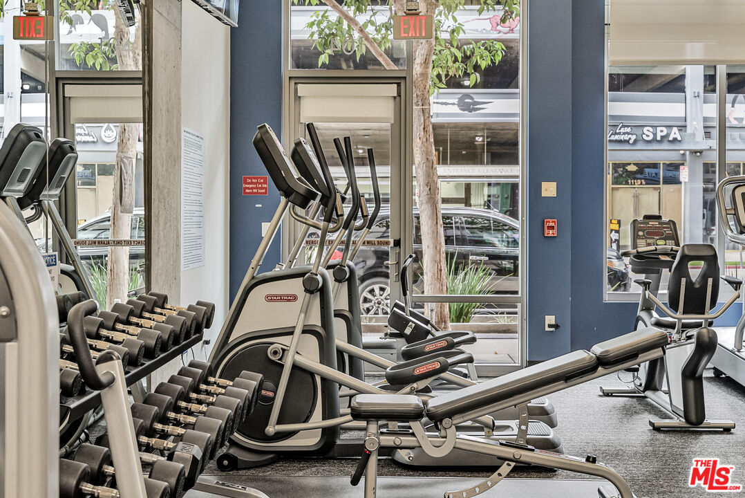 1100 South Hope Street, Unit 1501 Los Angeles, CA 90015 - Photo 56 of 63 a view of a room with gym equipment