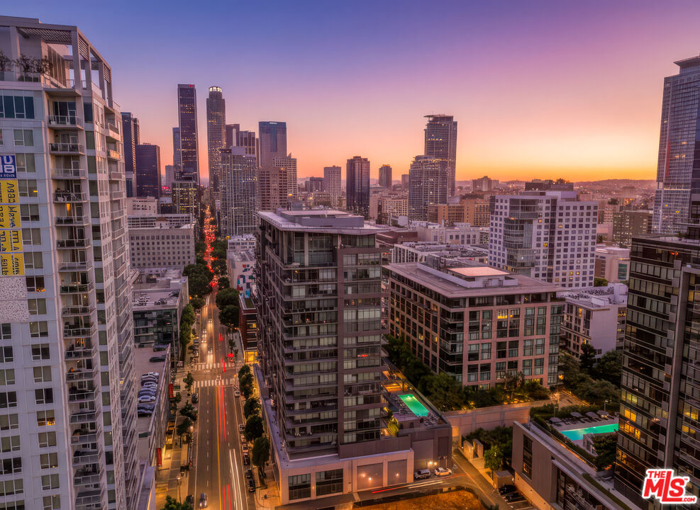 1100 South Hope Street, Unit 1501 Los Angeles, CA 90015 - Photo 7 of 63 a city view with tall buildings