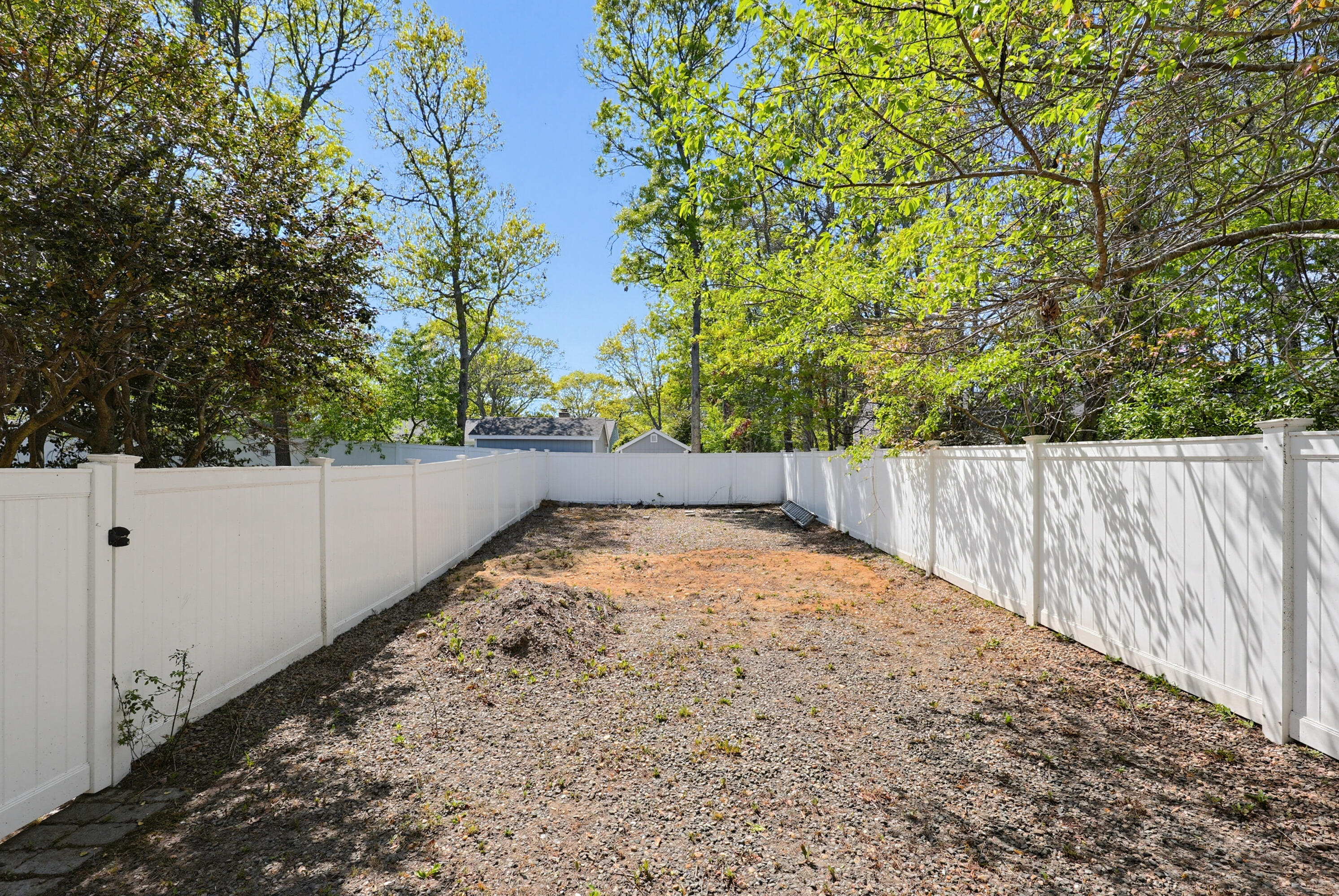 556 Cotuit Road Mashpee, MA 02649 - Photo 33 of 45 a view of a backyard of the house