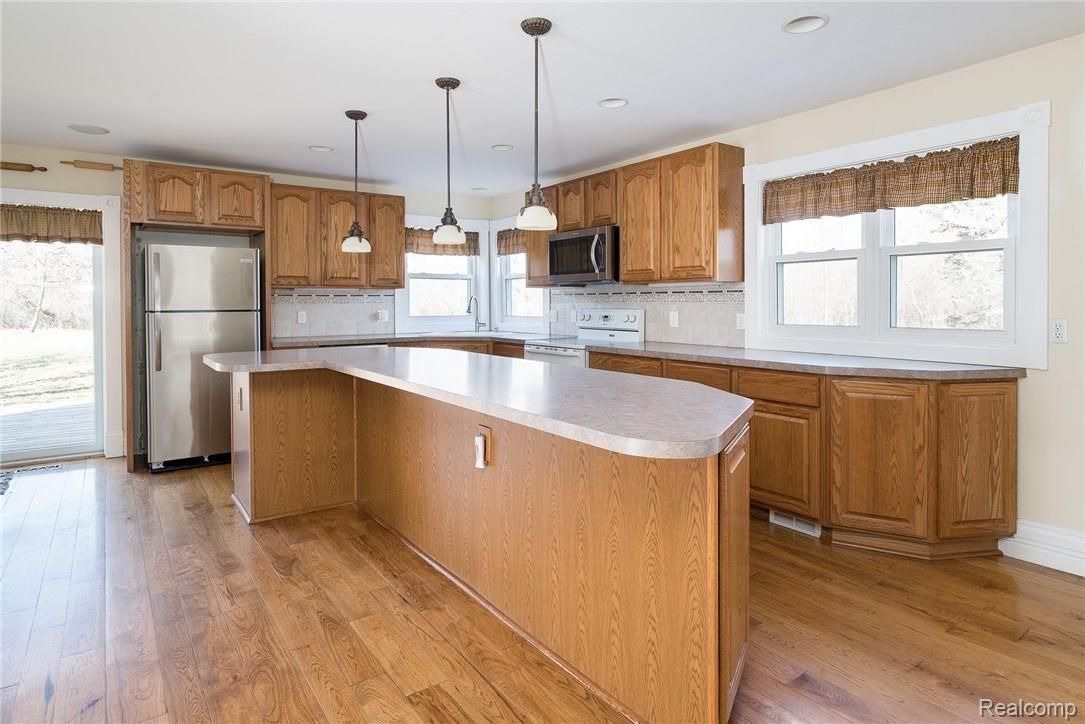 1290 7 Mile Road Whitmore Lake, MI 48189 - Photo 12 of 34 Large Kitchen Island
