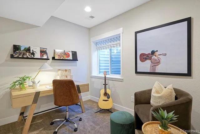 a workspace with furniture and a couch