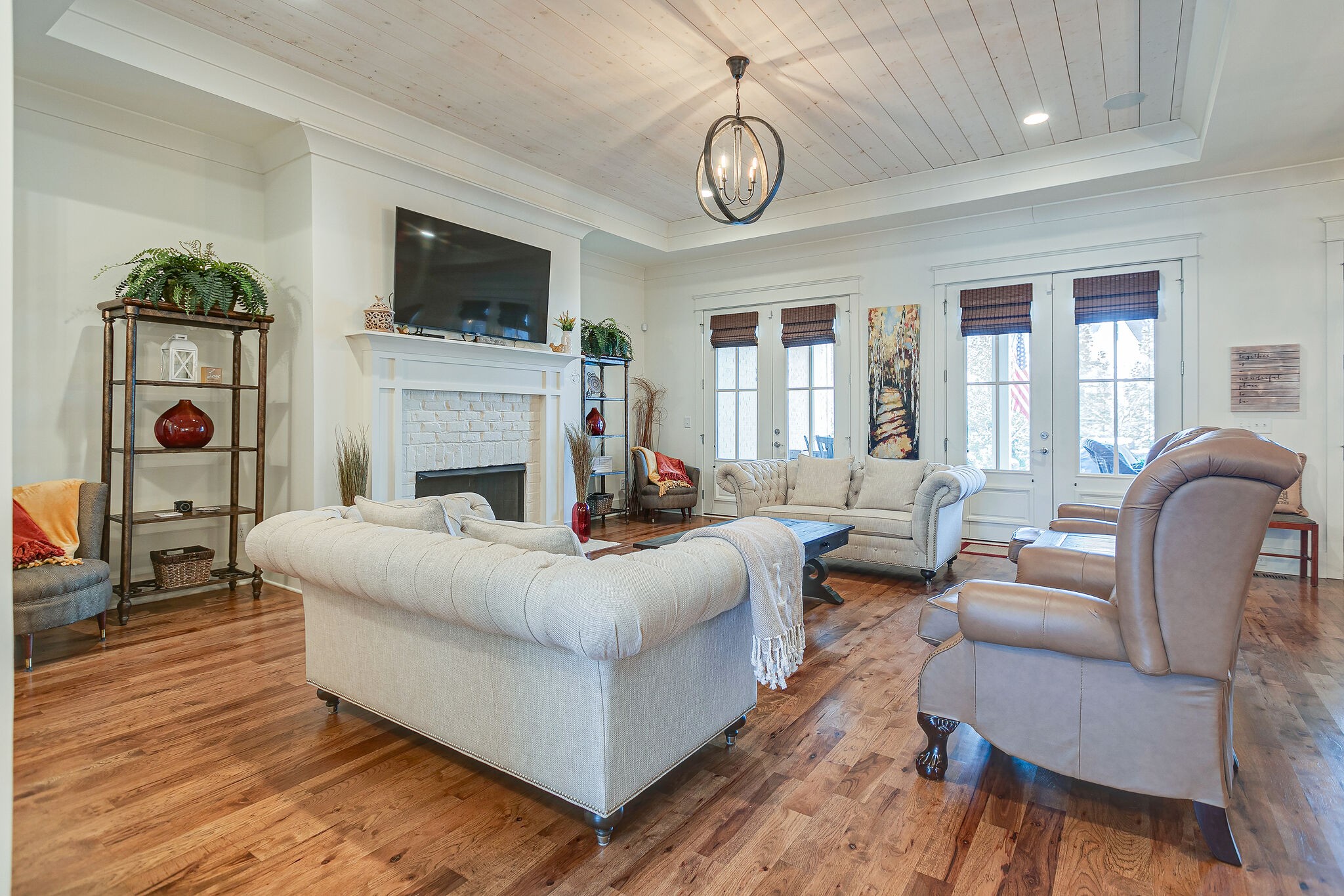 8448 Heirloom Boulevard College Grove, TN 37046 - Photo 11 of 41 a living room with fireplace furniture and a flat screen tv