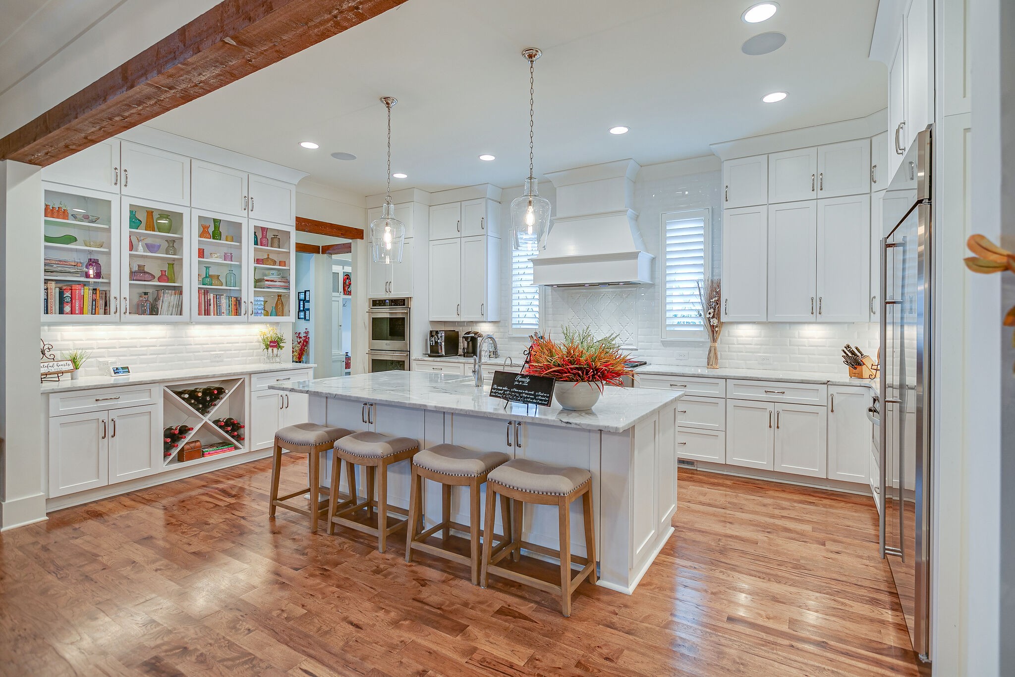 8448 Heirloom Boulevard College Grove, TN 37046 - Photo 13 of 41 a kitchen with a sink cabinets and wooden floor