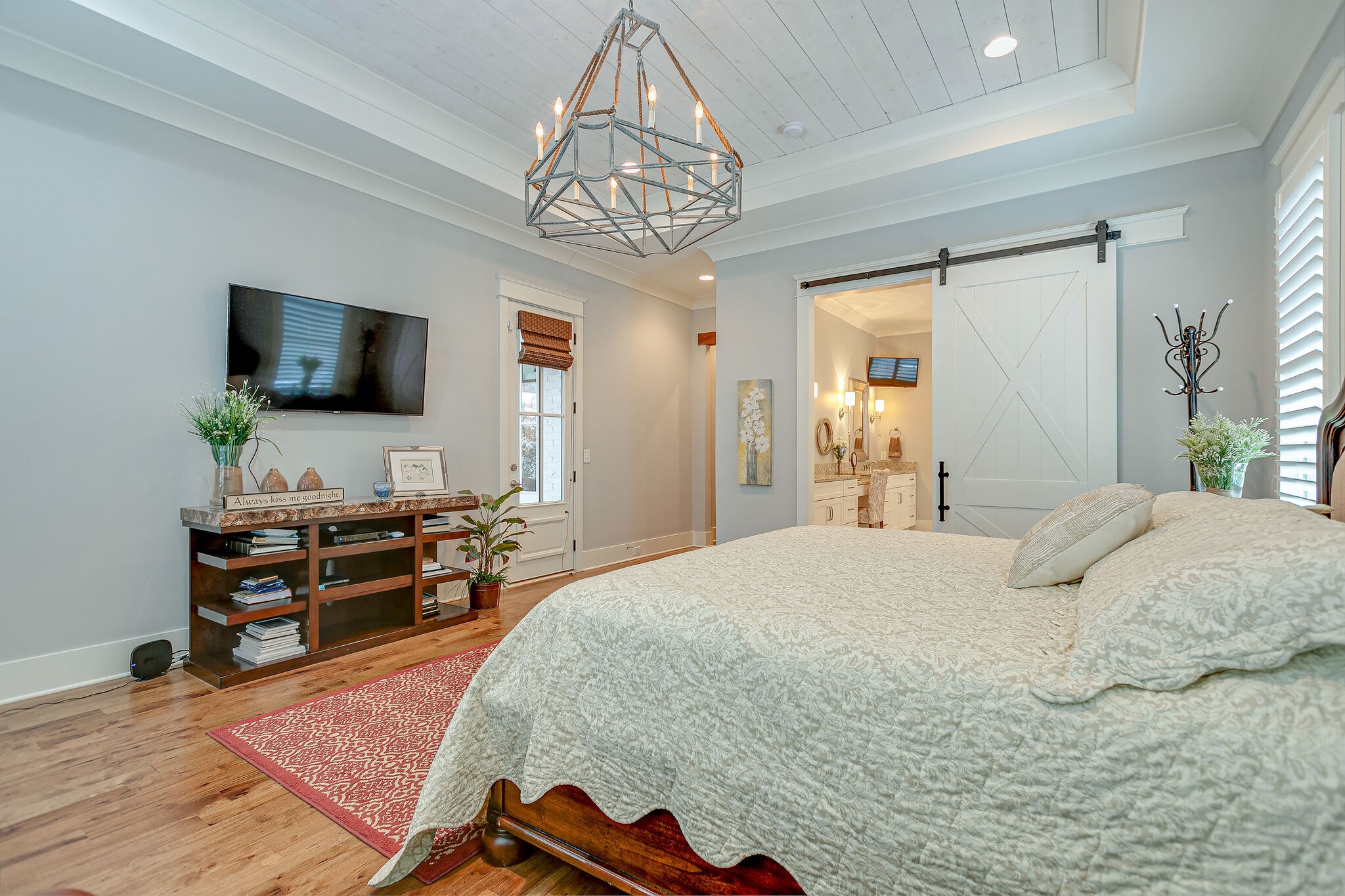 8448 Heirloom Boulevard College Grove, TN 37046 - Photo 21 of 41 a bedroom with a bed and a flat screen tv