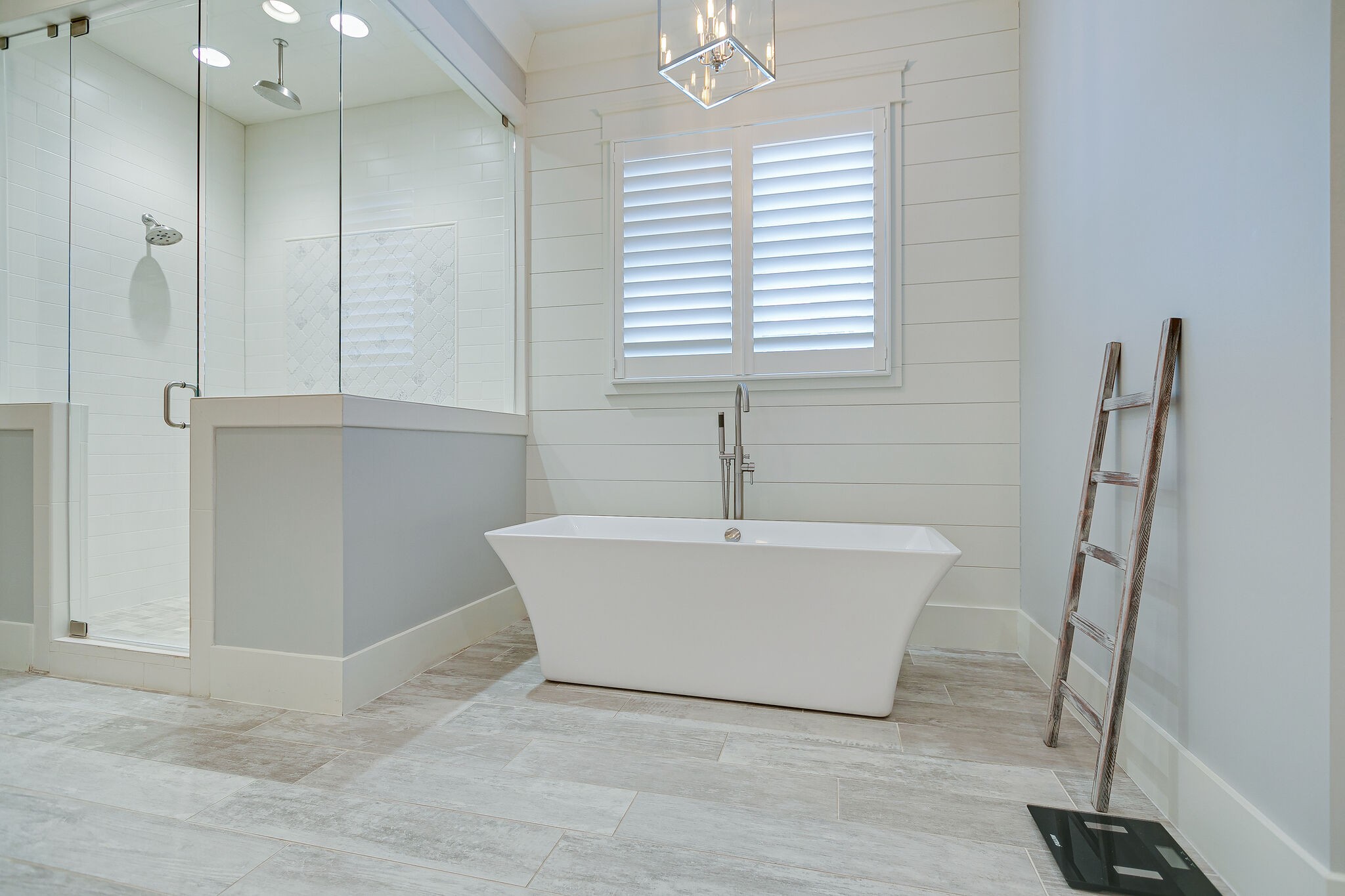 8448 Heirloom Boulevard College Grove, TN 37046 - Photo 23 of 41 a bathroom with a bathtub and shower