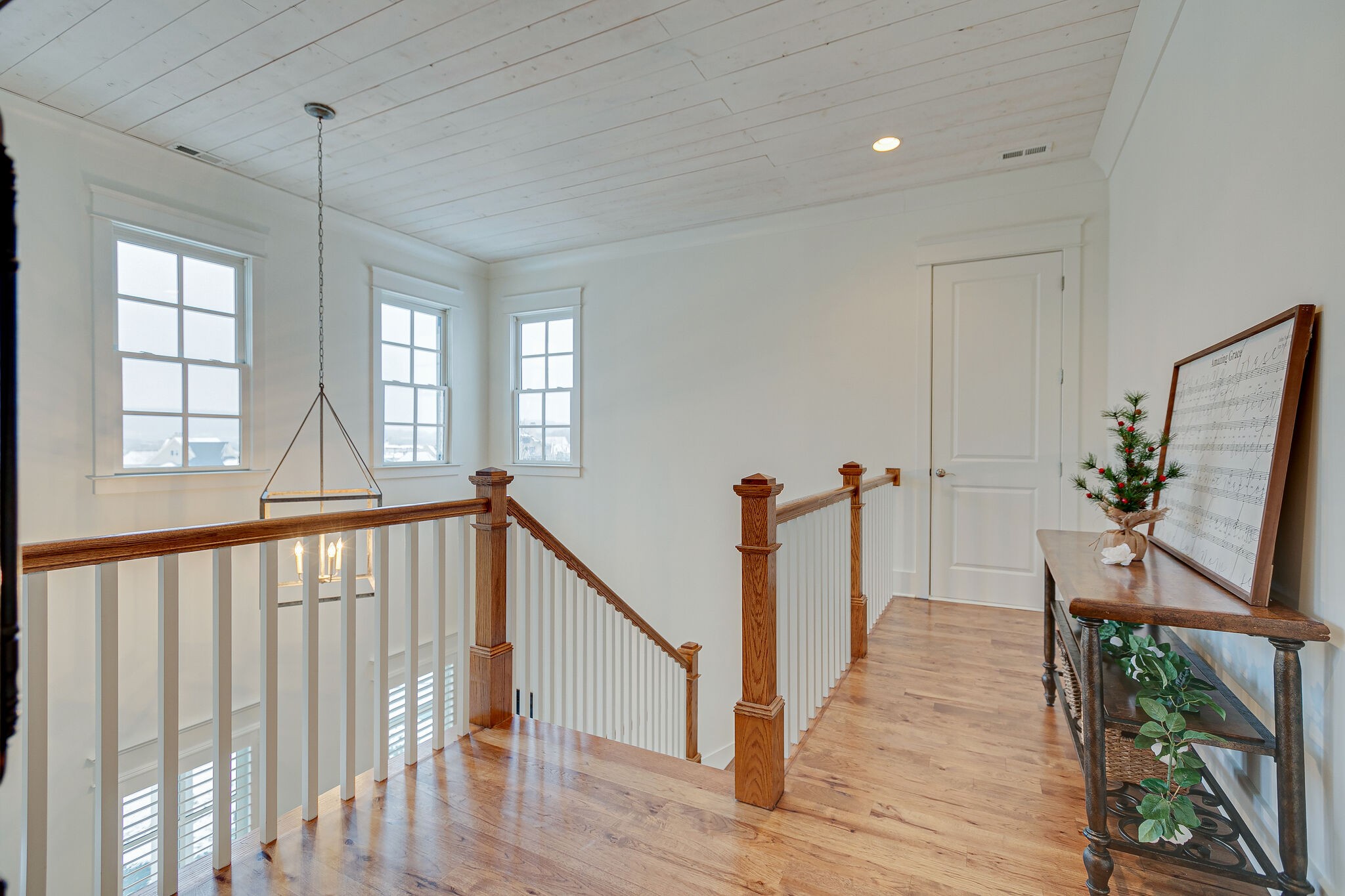 8448 Heirloom Boulevard College Grove, TN 37046 - Photo 28 of 41 a view of an entryway wooden floor and window
