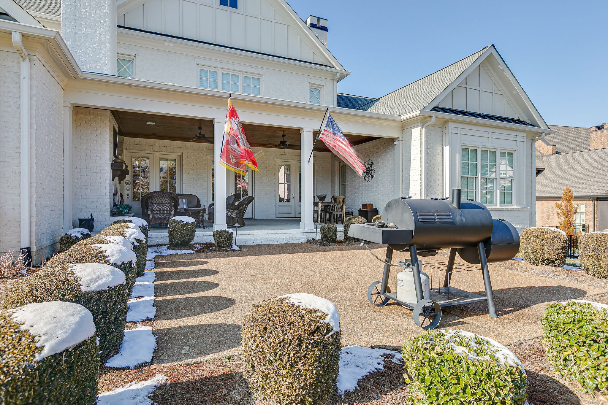 8448 Heirloom Boulevard College Grove, TN 37046 - Photo 40 of 41 a living room filled with furniture and a chandelier
