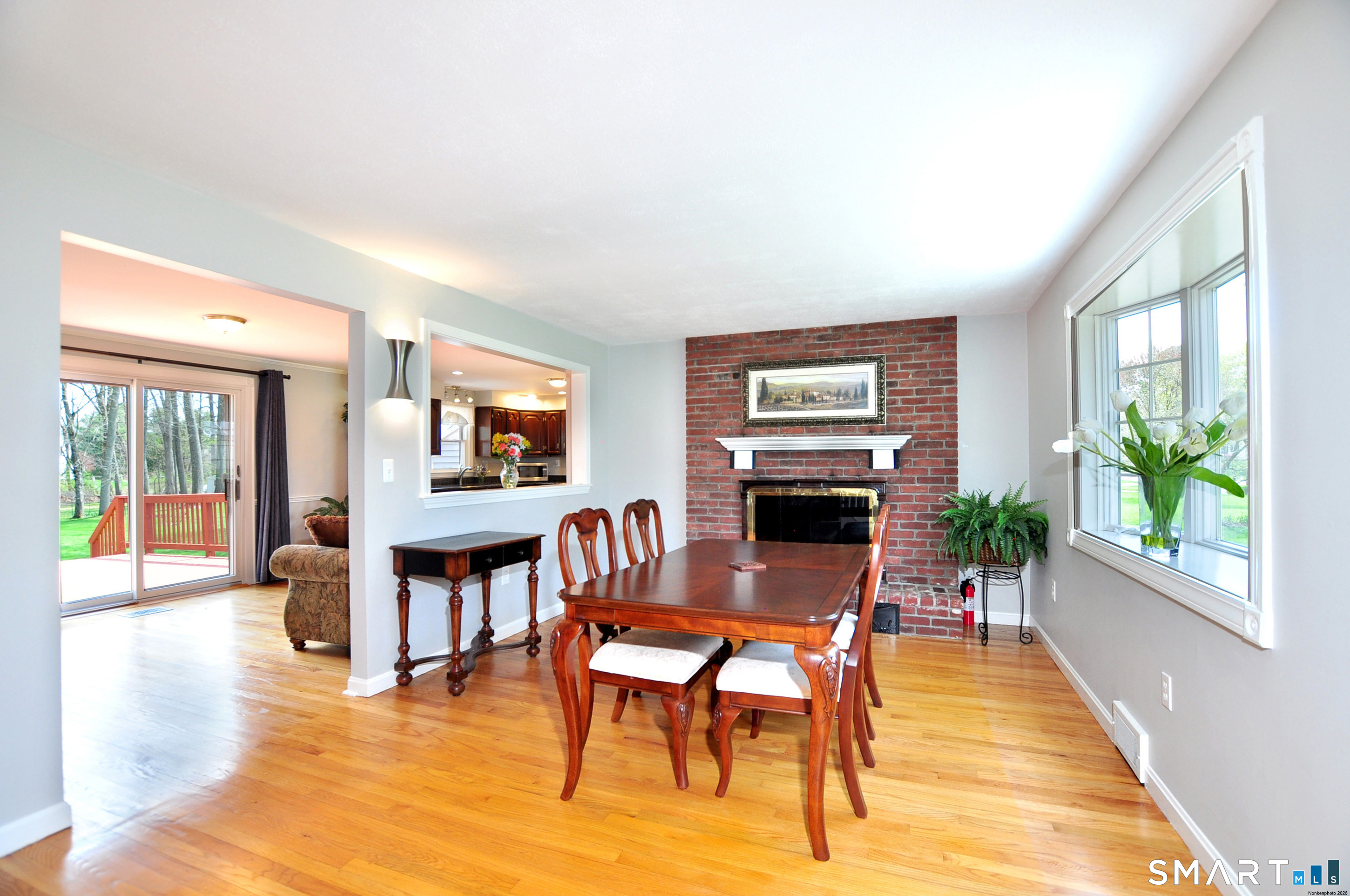 36 Pilgrim Drive Windsor, CT 06095 - Photo 11 of 33 a view of a livingroom with furniture window and wooden floor