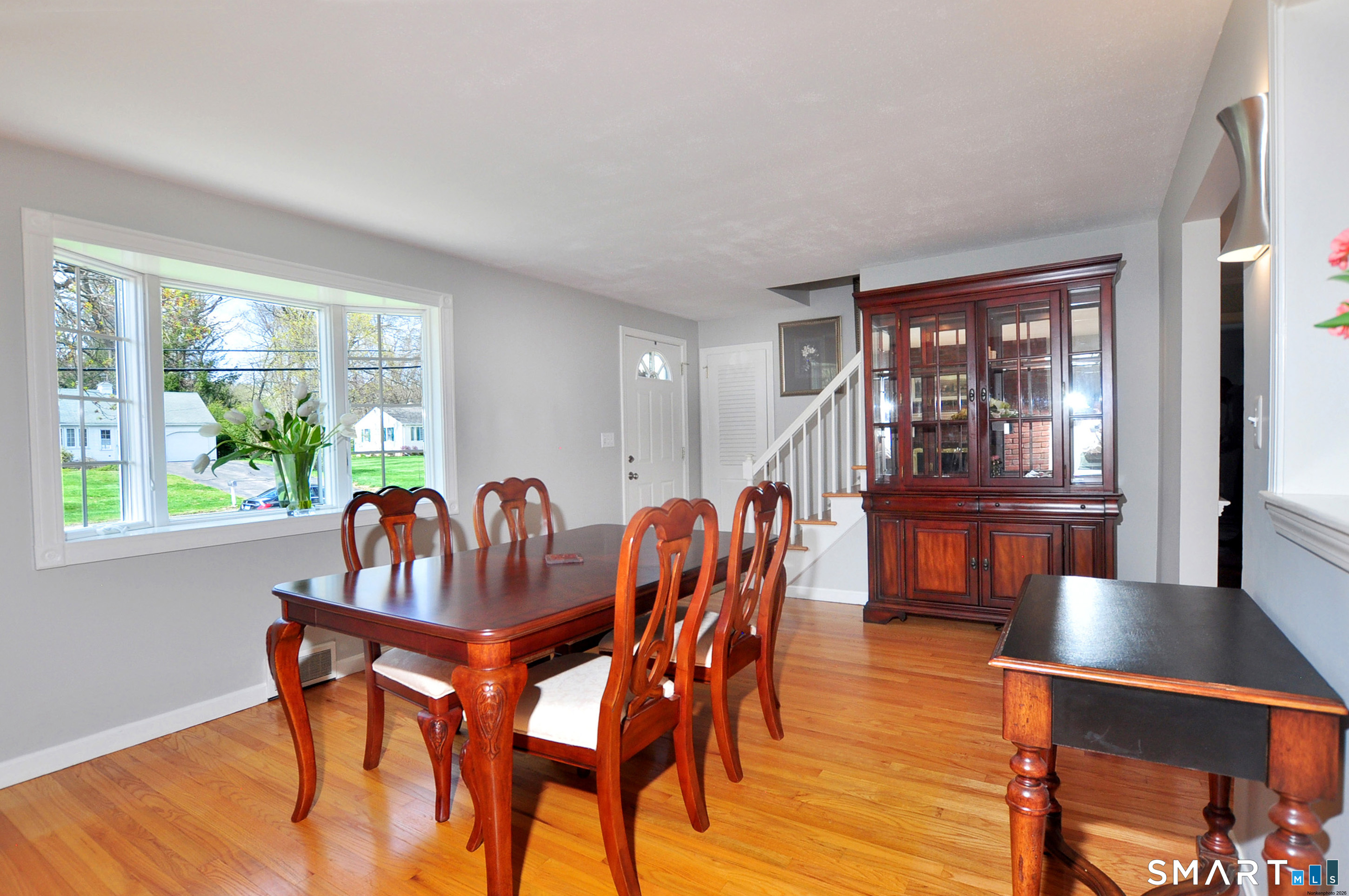 36 Pilgrim Drive Windsor, CT 06095 - Photo 13 of 33 a dining room with furniture and wooden floor
