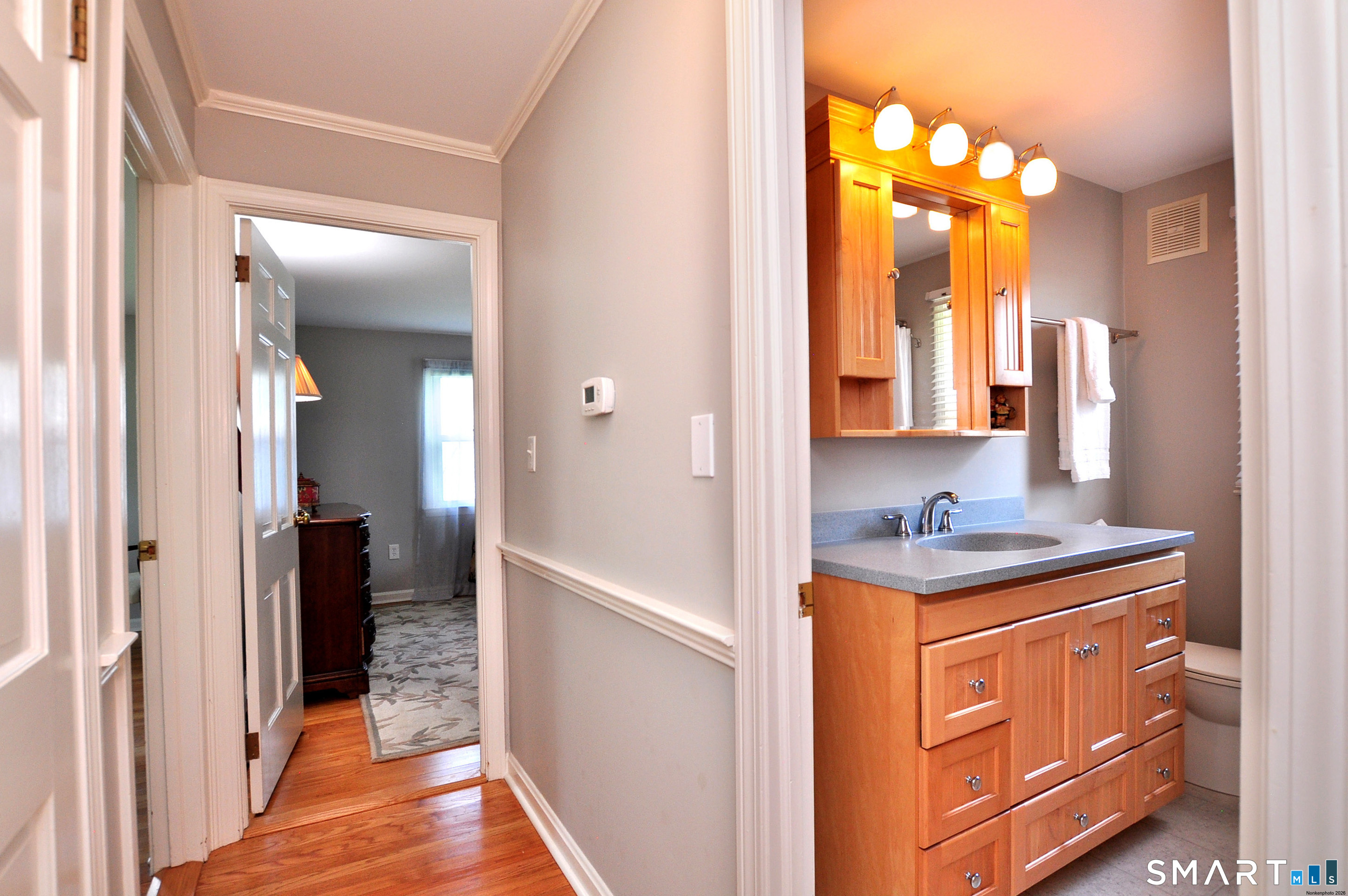 36 Pilgrim Drive Windsor, CT 06095 - Photo 17 of 33 a bathroom with a sink and a mirror