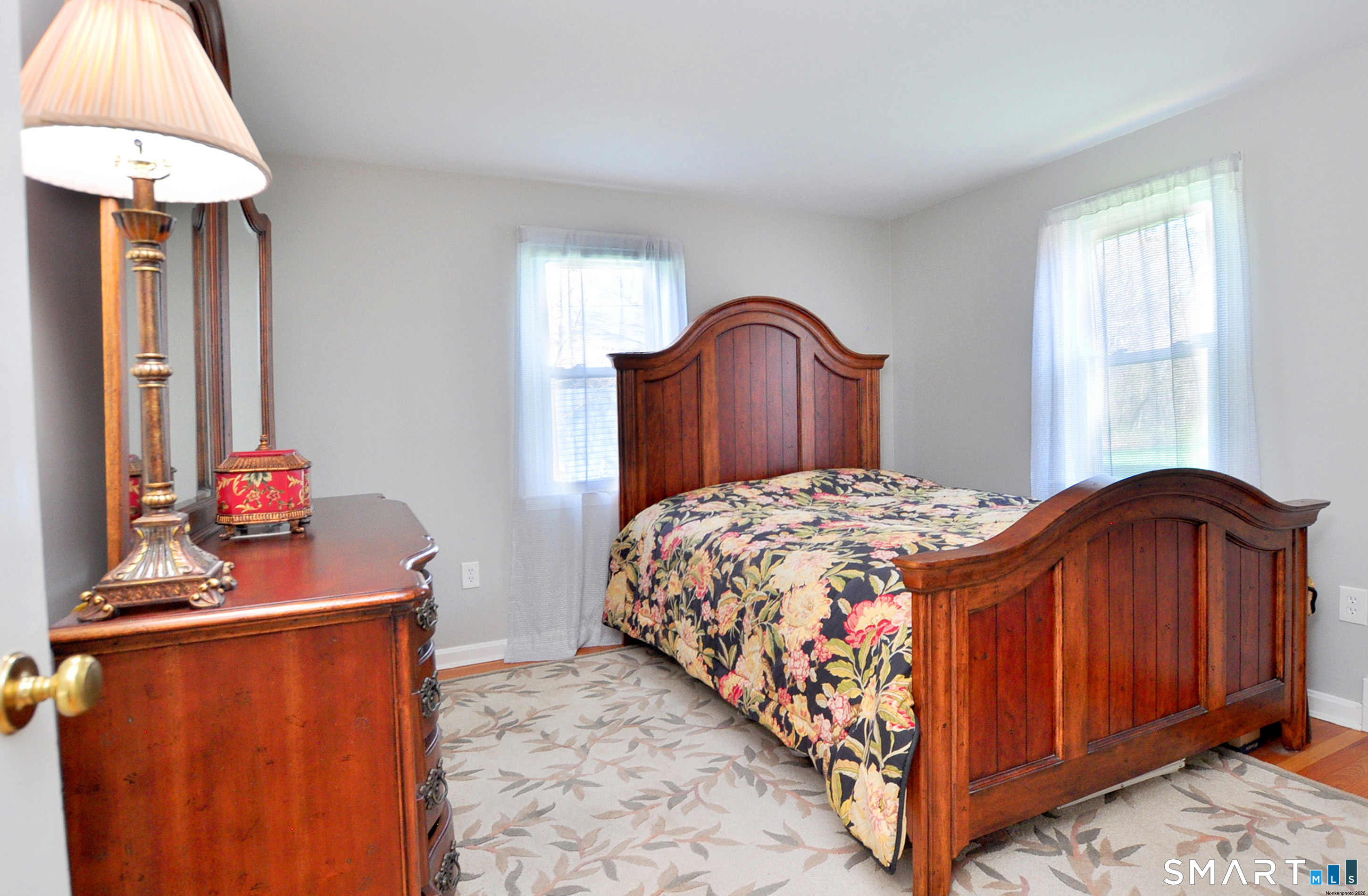 36 Pilgrim Drive Windsor, CT 06095 - Photo 18 of 33 a bedroom with a bed and a dresser