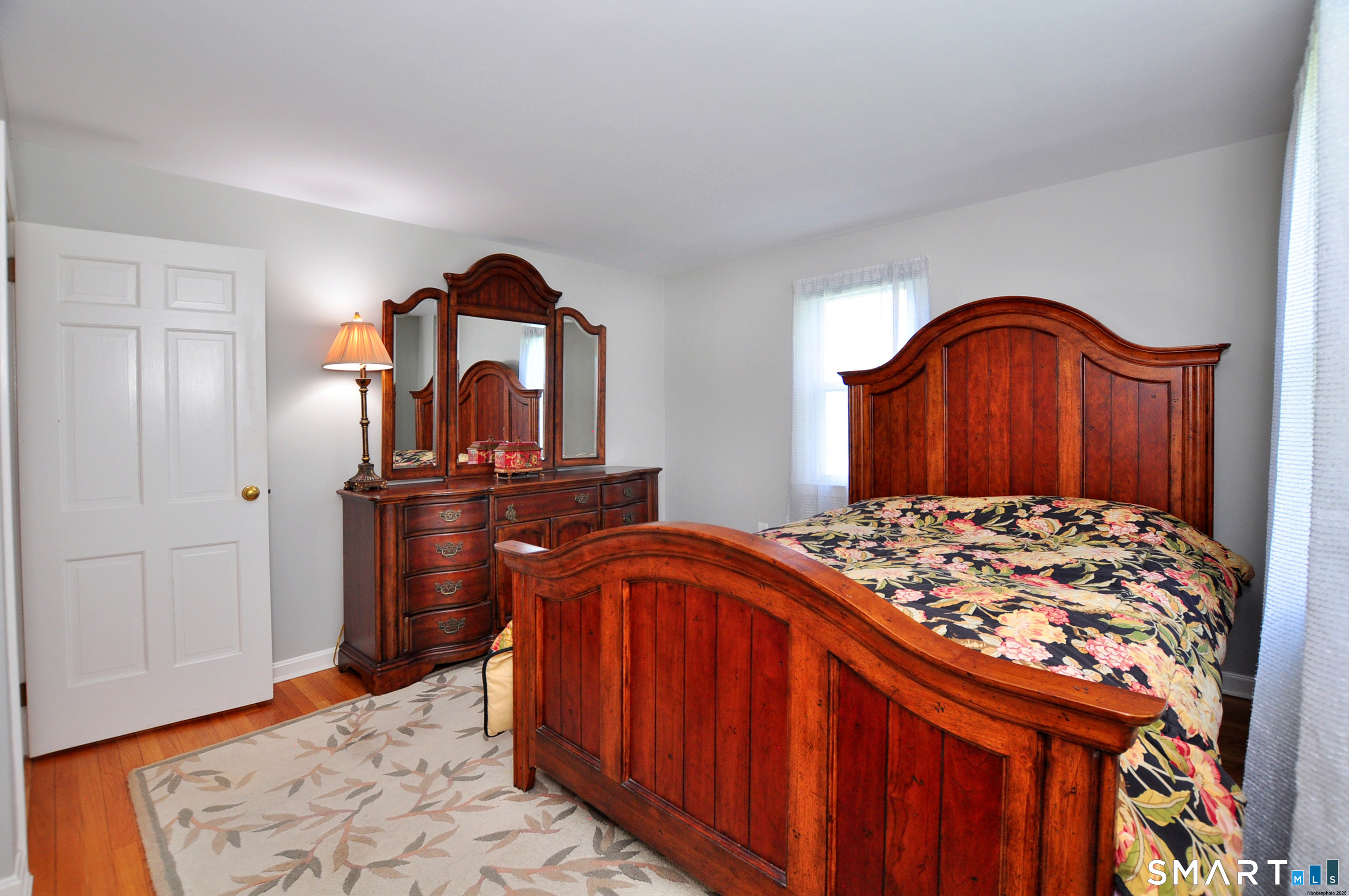 36 Pilgrim Drive Windsor, CT 06095 - Photo 19 of 33 a bedroom with a bed and a dresser