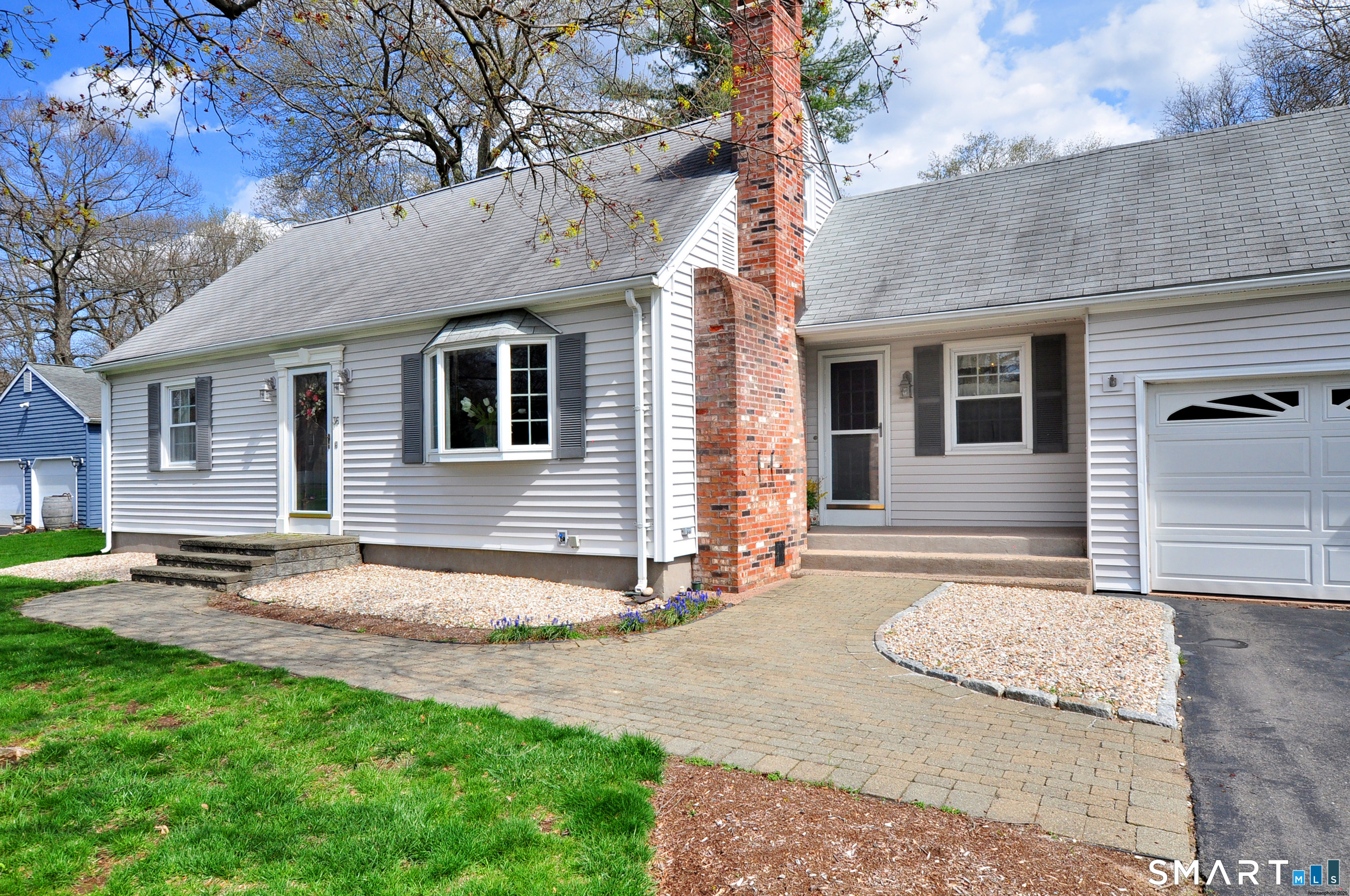 36 Pilgrim Drive Windsor, CT 06095 - Photo 2 of 33 a backyard of a house with seating space