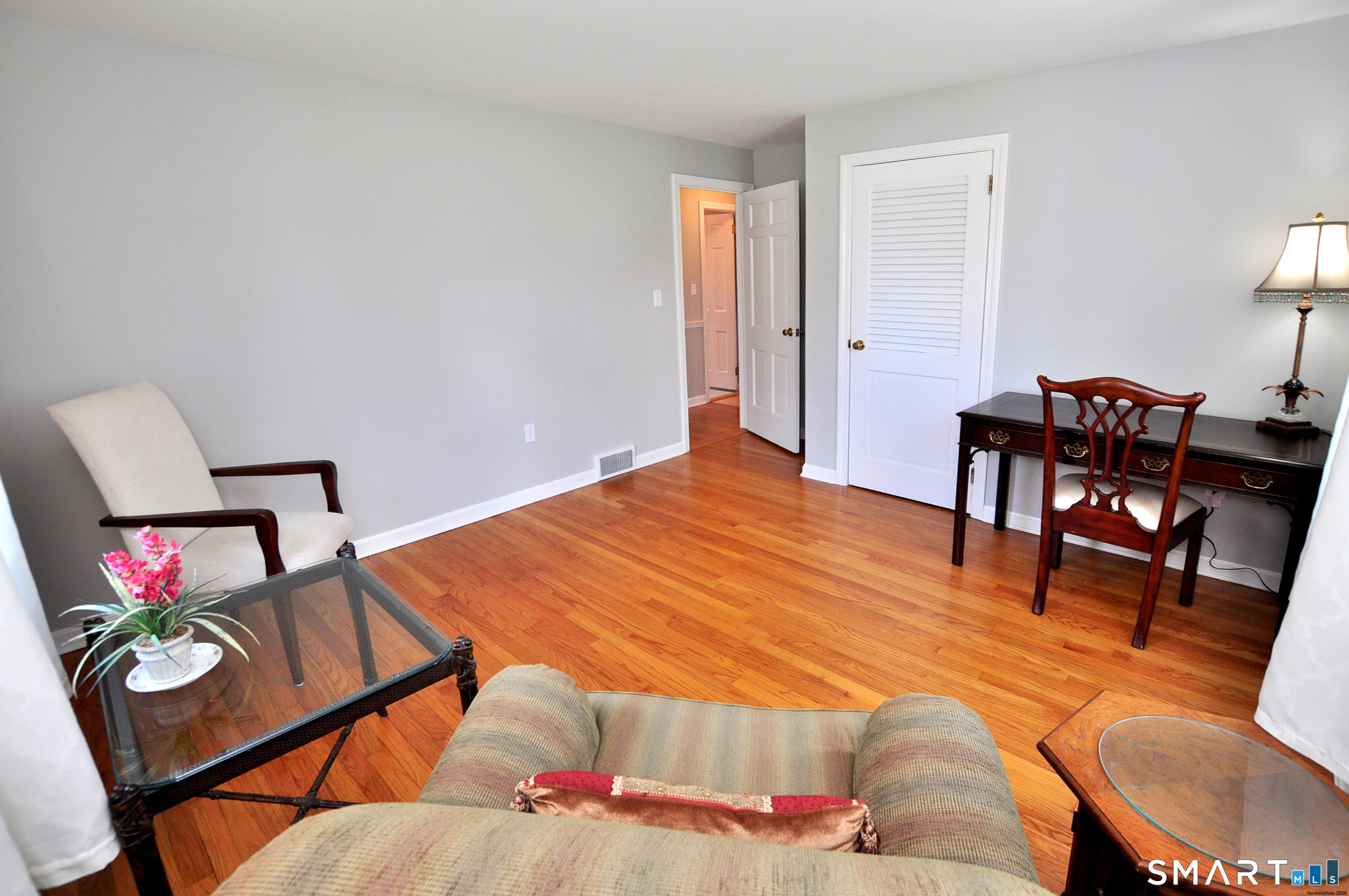 36 Pilgrim Drive Windsor, CT 06095 - Photo 21 of 33 a bed room with a bed window and a chair