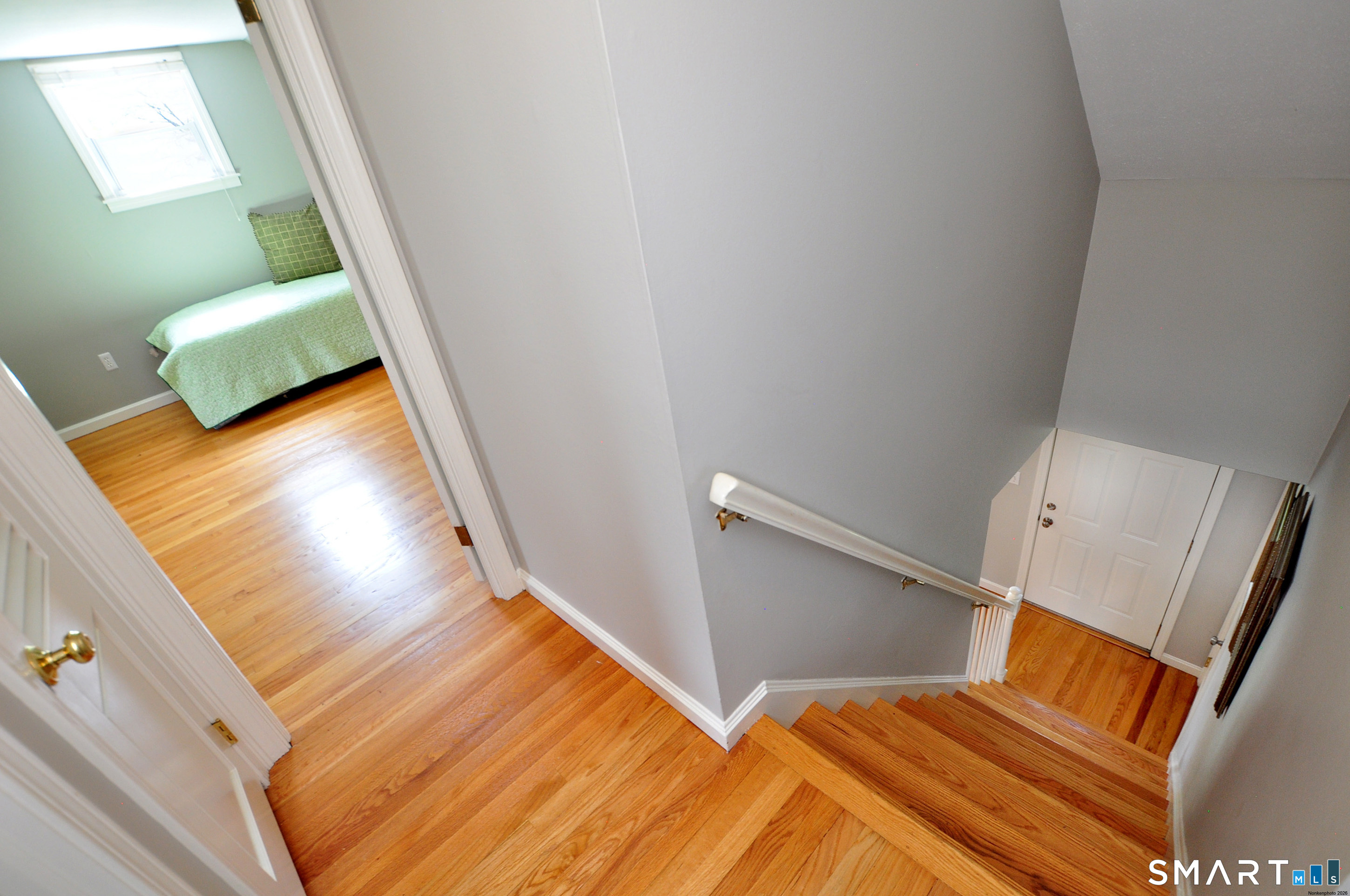 36 Pilgrim Drive Windsor, CT 06095 - Photo 24 of 33 a view of an empty room and wooden floor