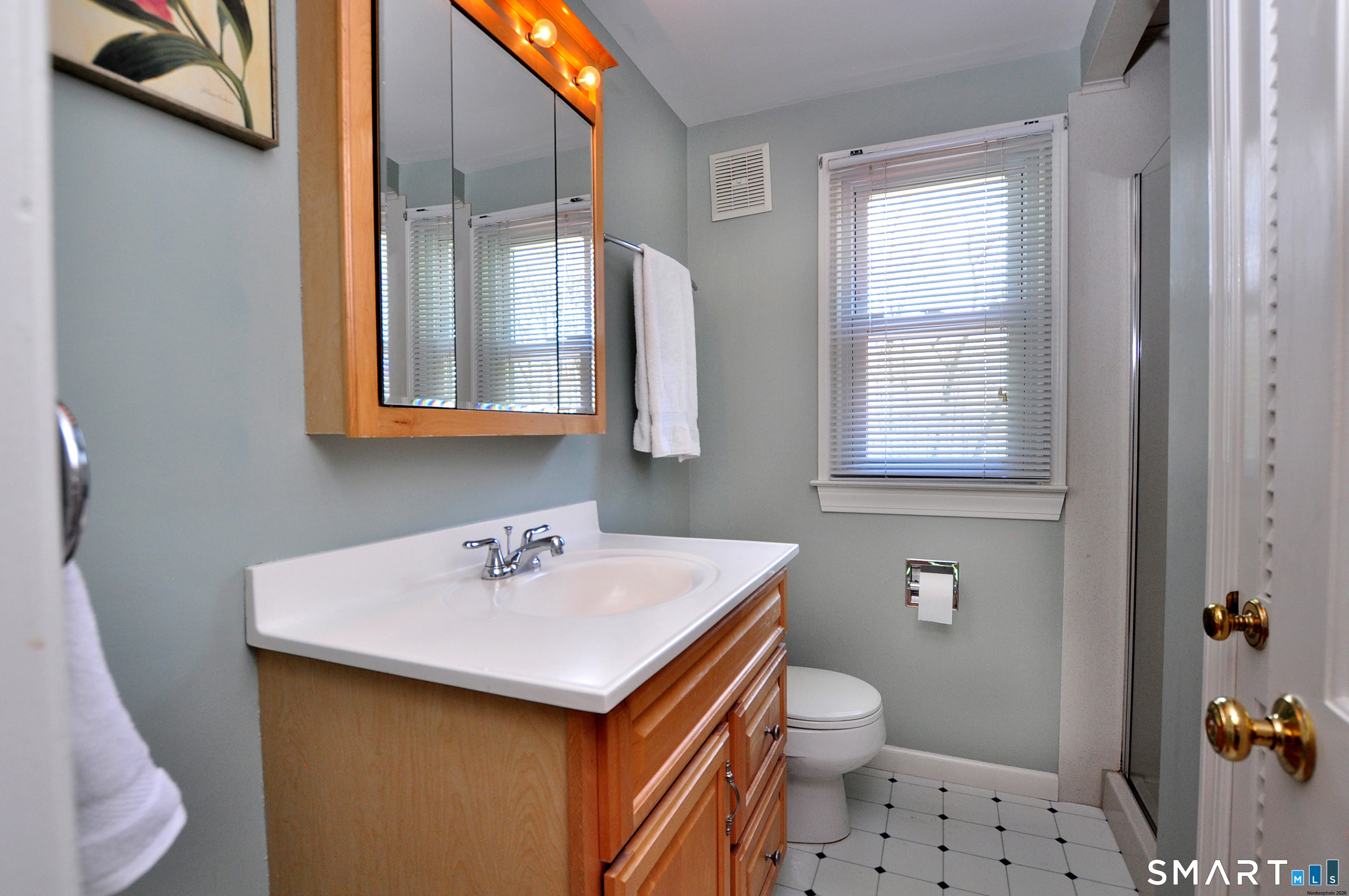 36 Pilgrim Drive Windsor, CT 06095 - Photo 26 of 33 a bathroom with a sink a toilet and a window