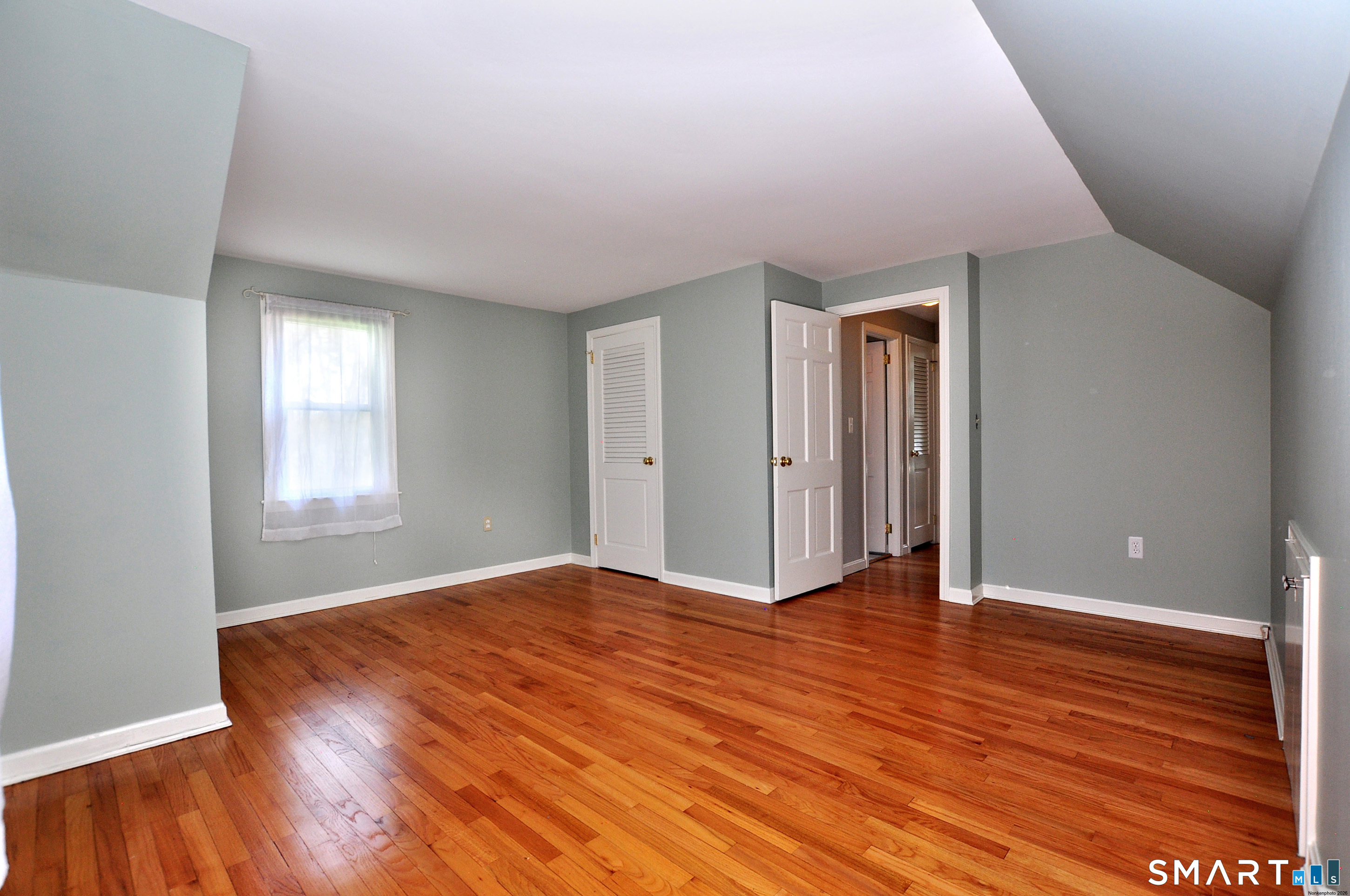 36 Pilgrim Drive Windsor, CT 06095 - Photo 28 of 33 wooden floor in an empty room with a window