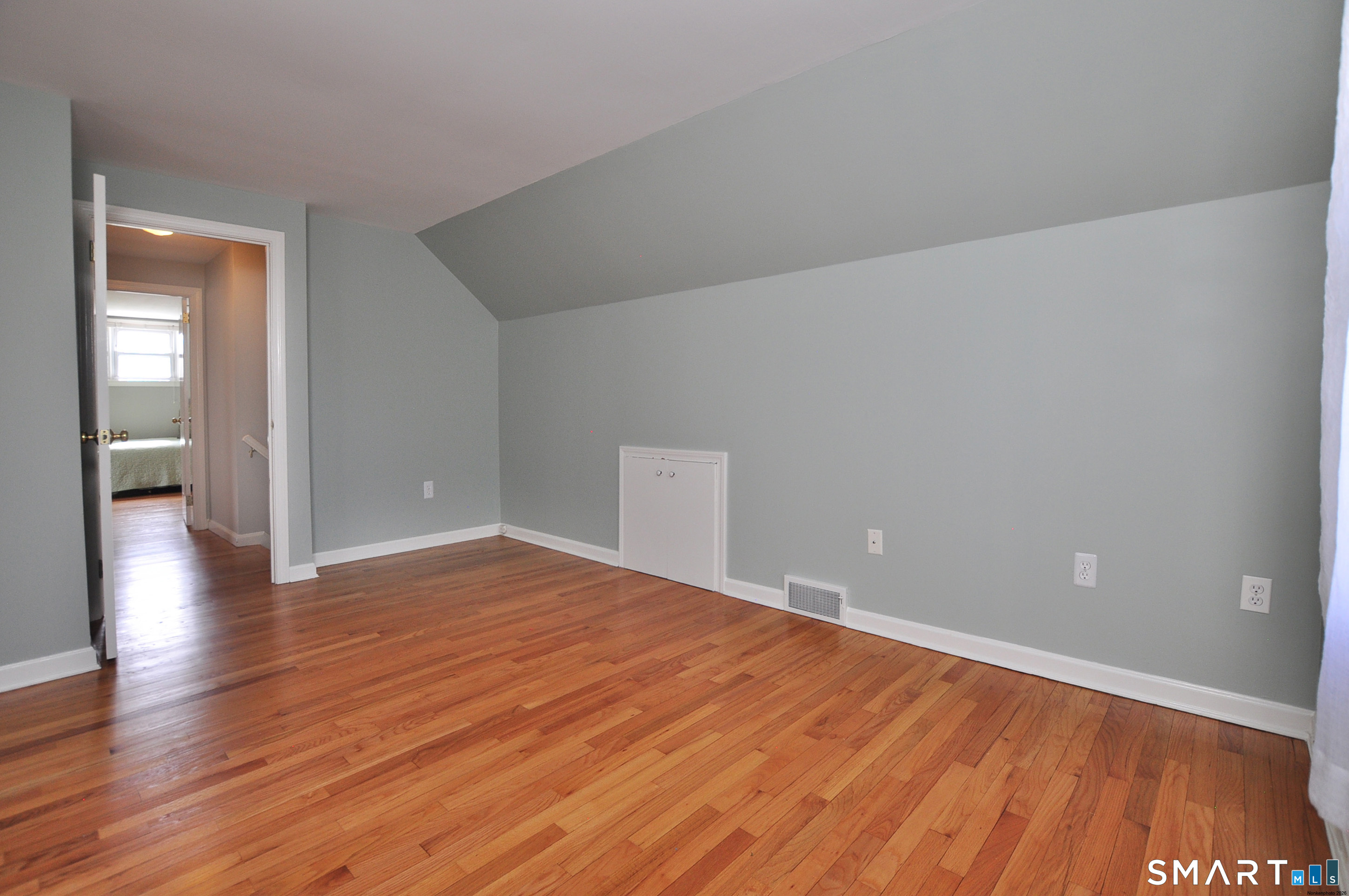 36 Pilgrim Drive Windsor, CT 06095 - Photo 29 of 33 a view of an empty room and wooden floor