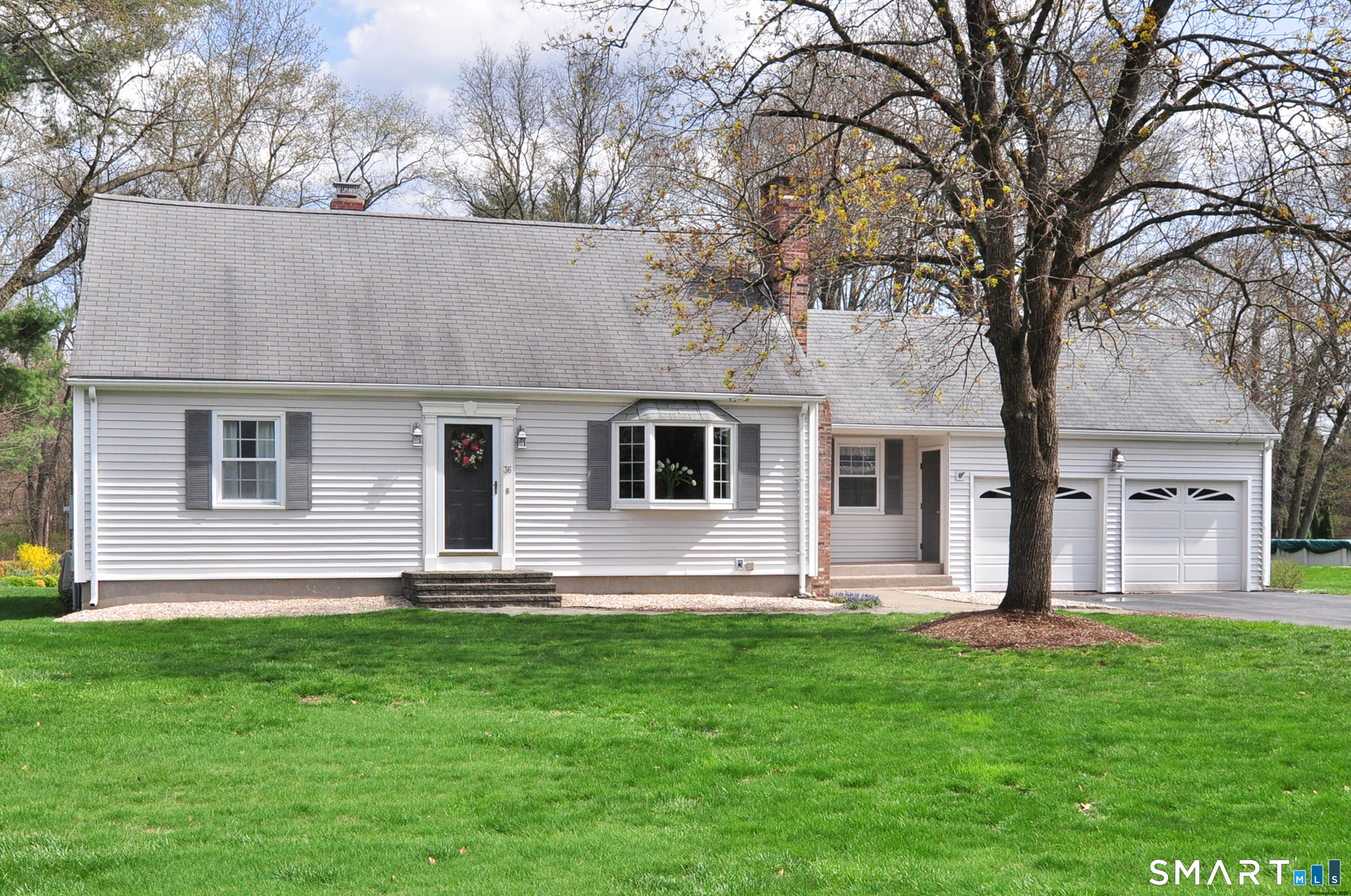 36 Pilgrim Drive Windsor, CT 06095 - Photo 33 of 33 a front view of house with yard and green space