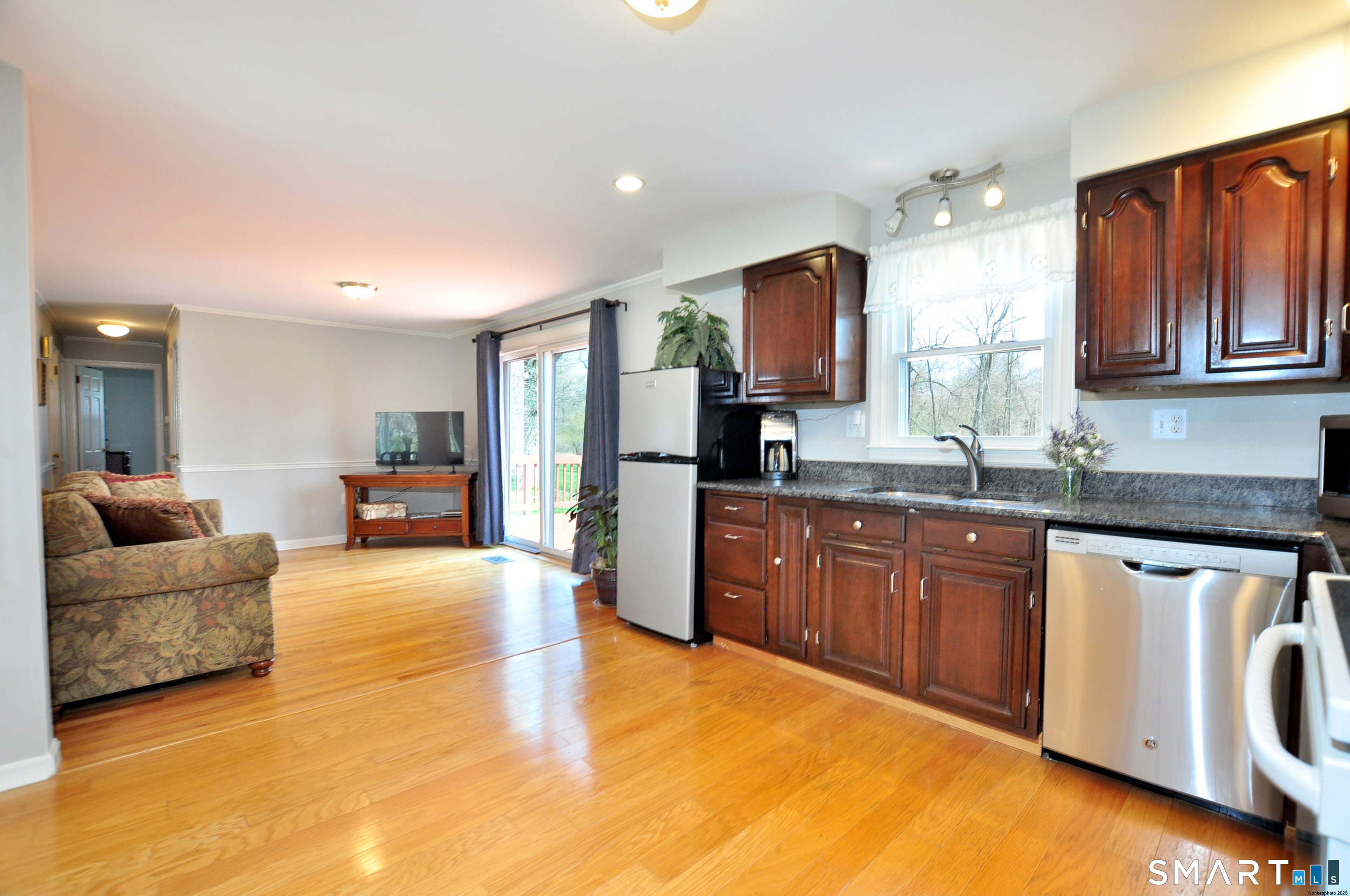 36 Pilgrim Drive Windsor, CT 06095 - Photo 9 of 33 a large kitchen with stainless steel appliances granite countertop a sink and cabinets