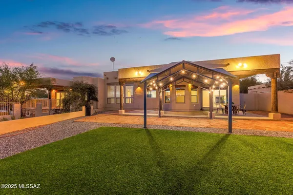 a view of a house with a swimming pool