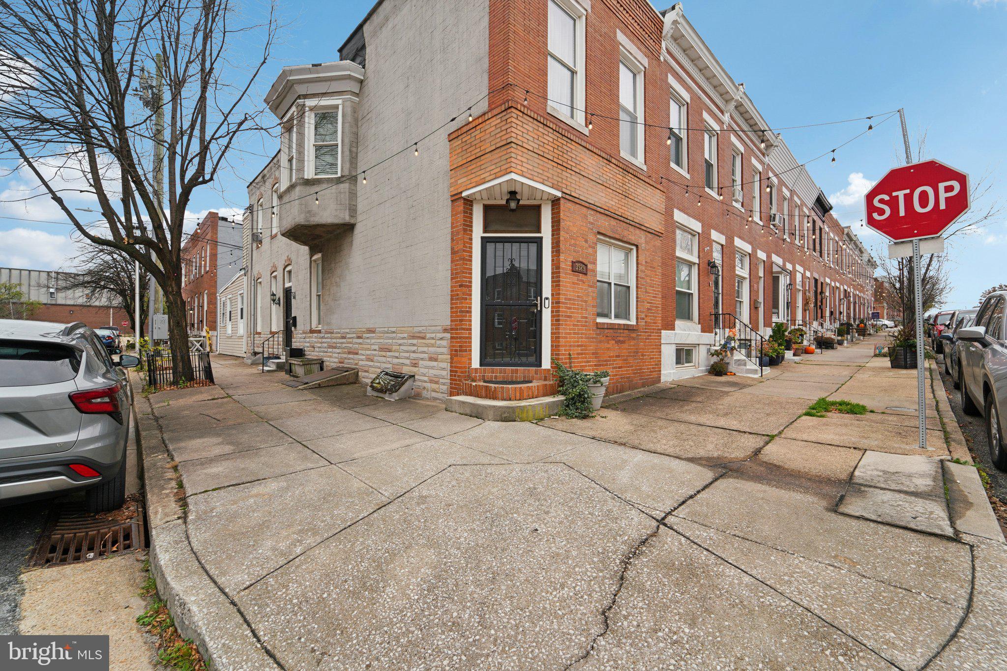 3929 Hudson Street Baltimore, MD 21224 - Photo 1 of 48 a view of a street with cars