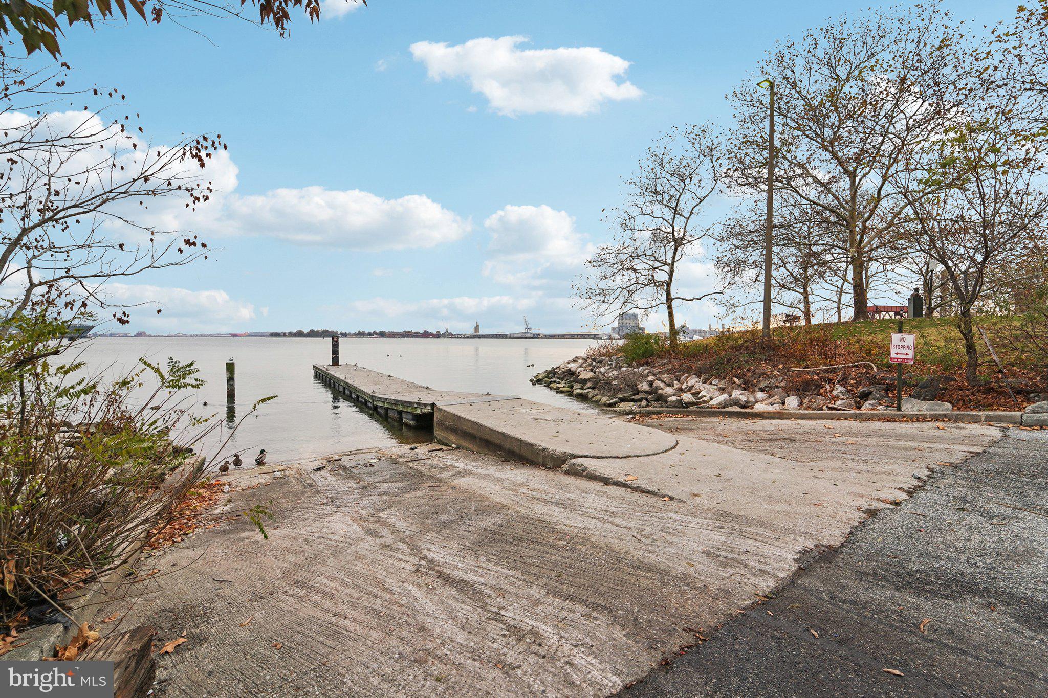 3929 Hudson Street Baltimore, MD 21224 - Photo 35 of 48 a view of a dry yard with wooden fence