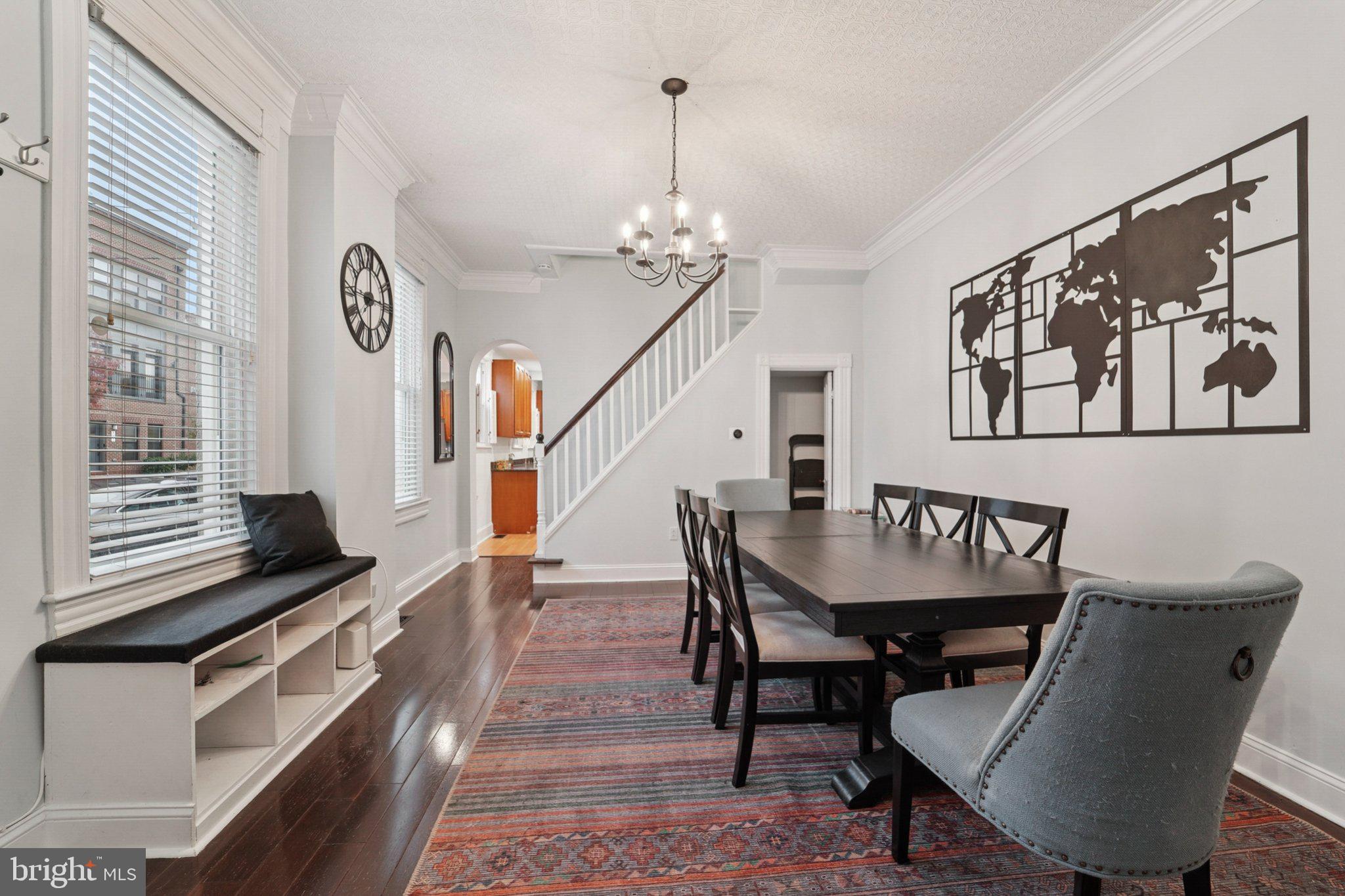 3929 Hudson Street Baltimore, MD 21224 - Photo 9 of 48 a view of a dining room with furniture and wooden floor