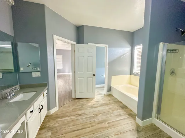 a view of a balcony with wooden floor